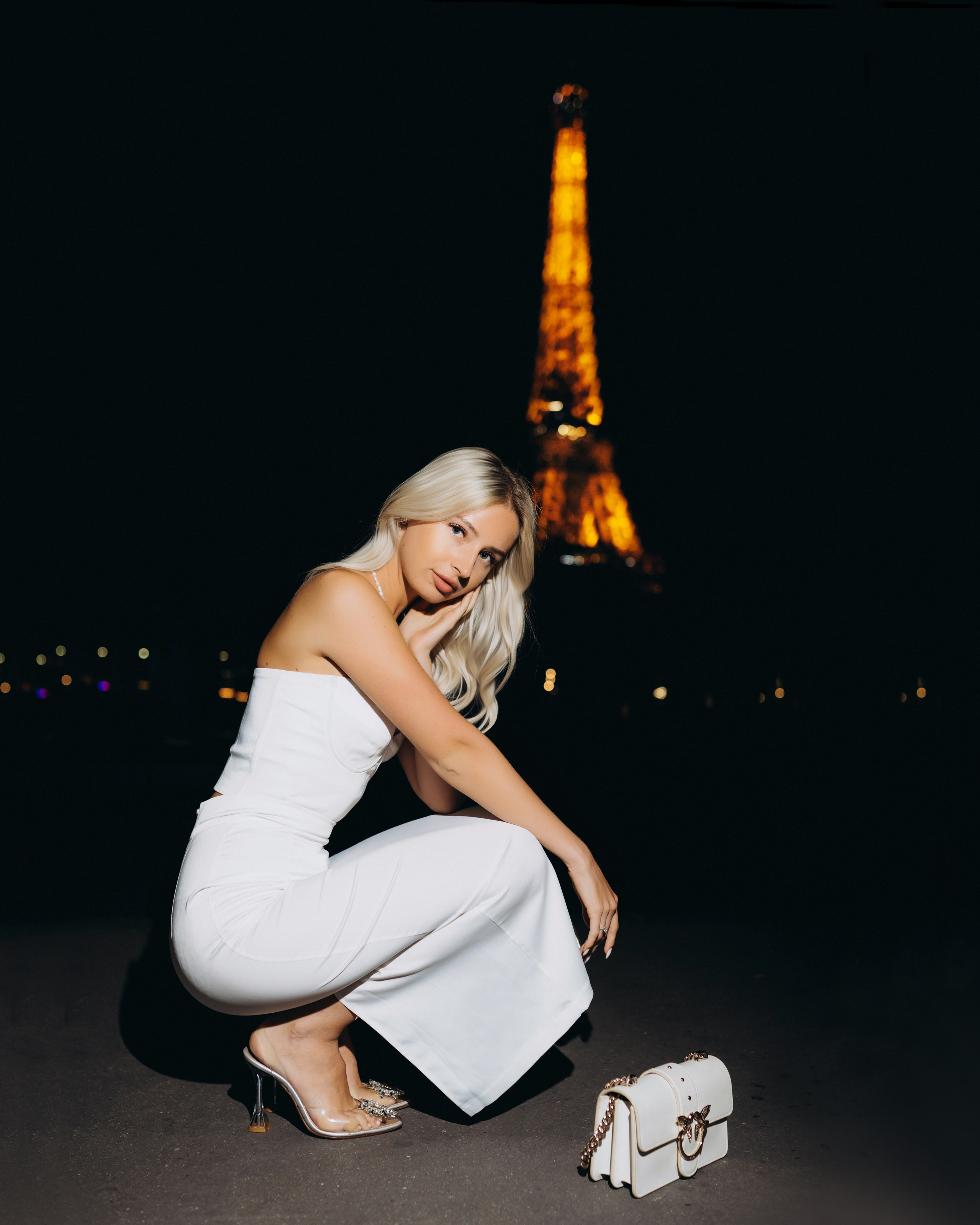 Night individual portrait against the city lights of Paris