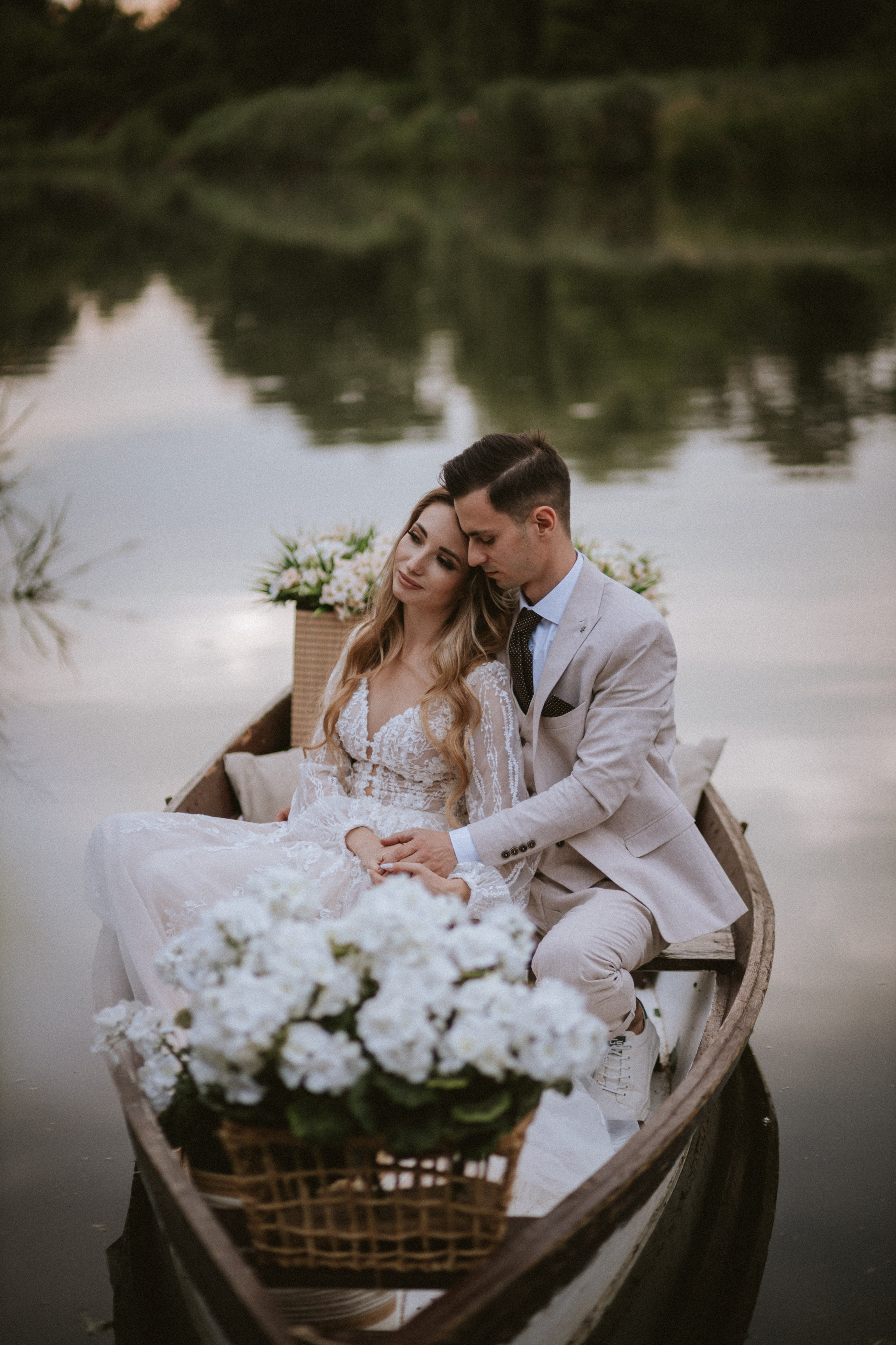 Decorated boat with fresh flowers and romantic atmosphere for elopement session