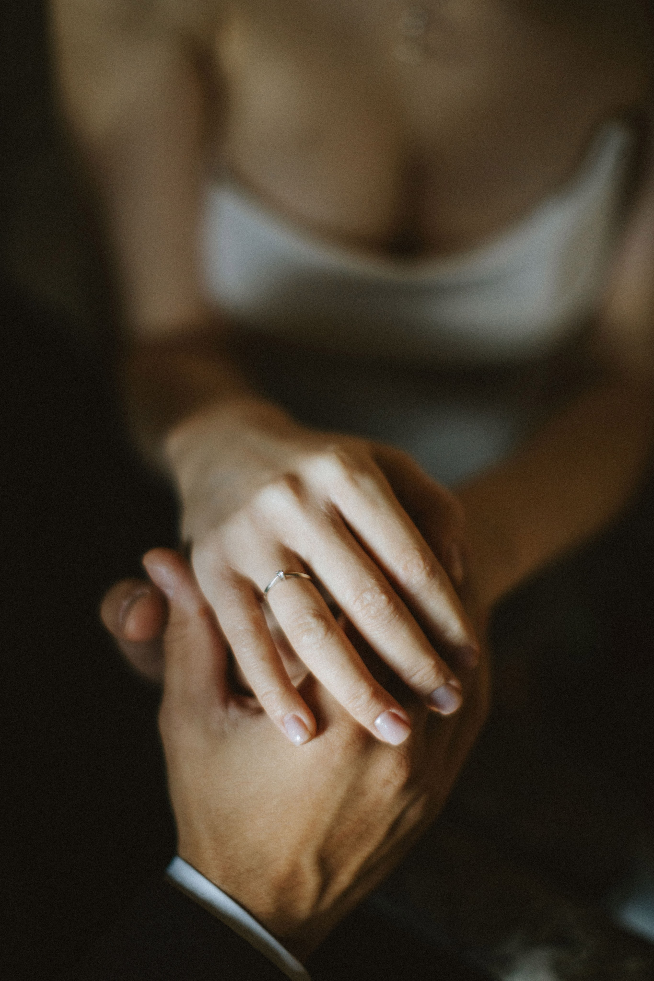 "Wedding details rings and bouquet"