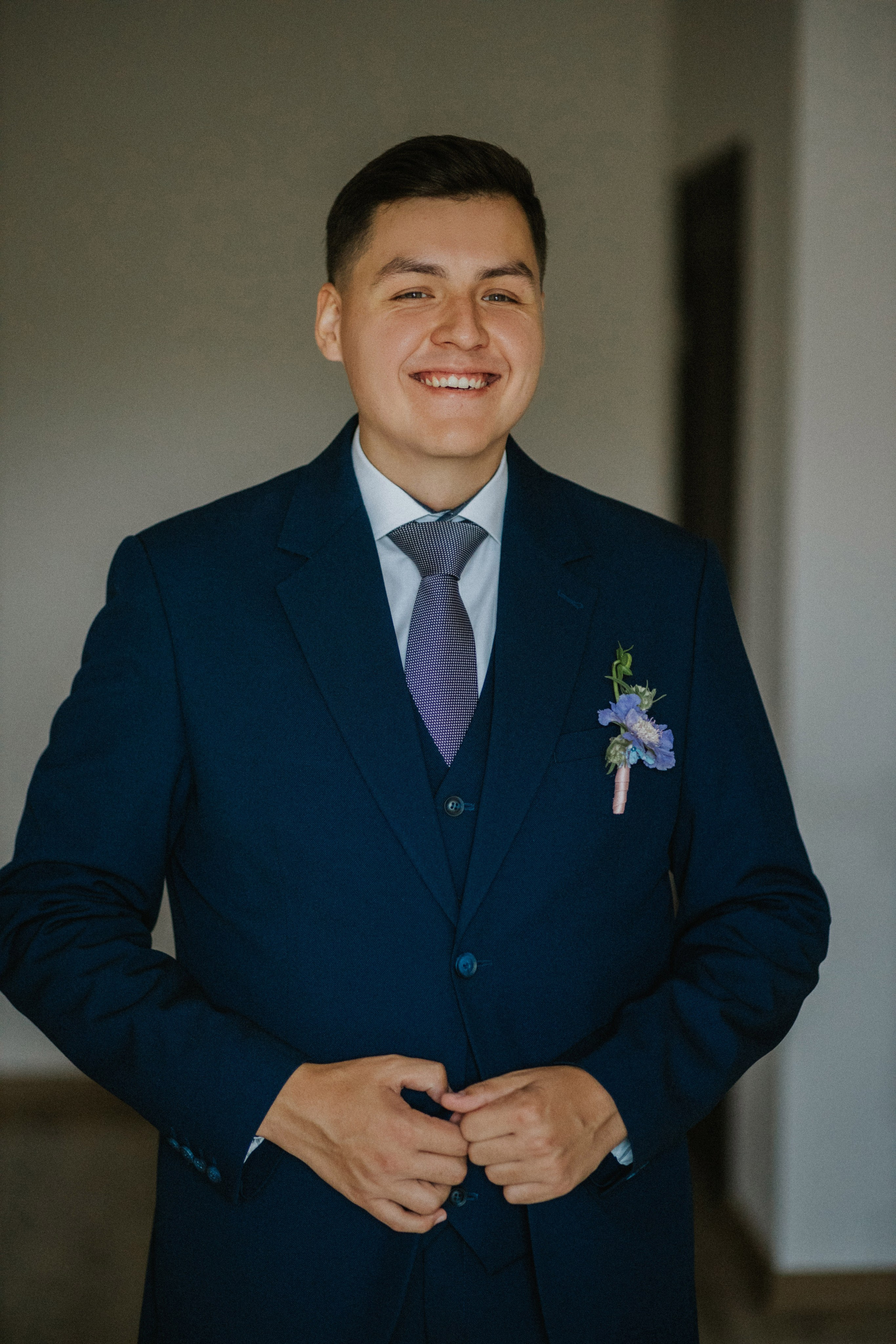 "Groom portrait in natural light at home"