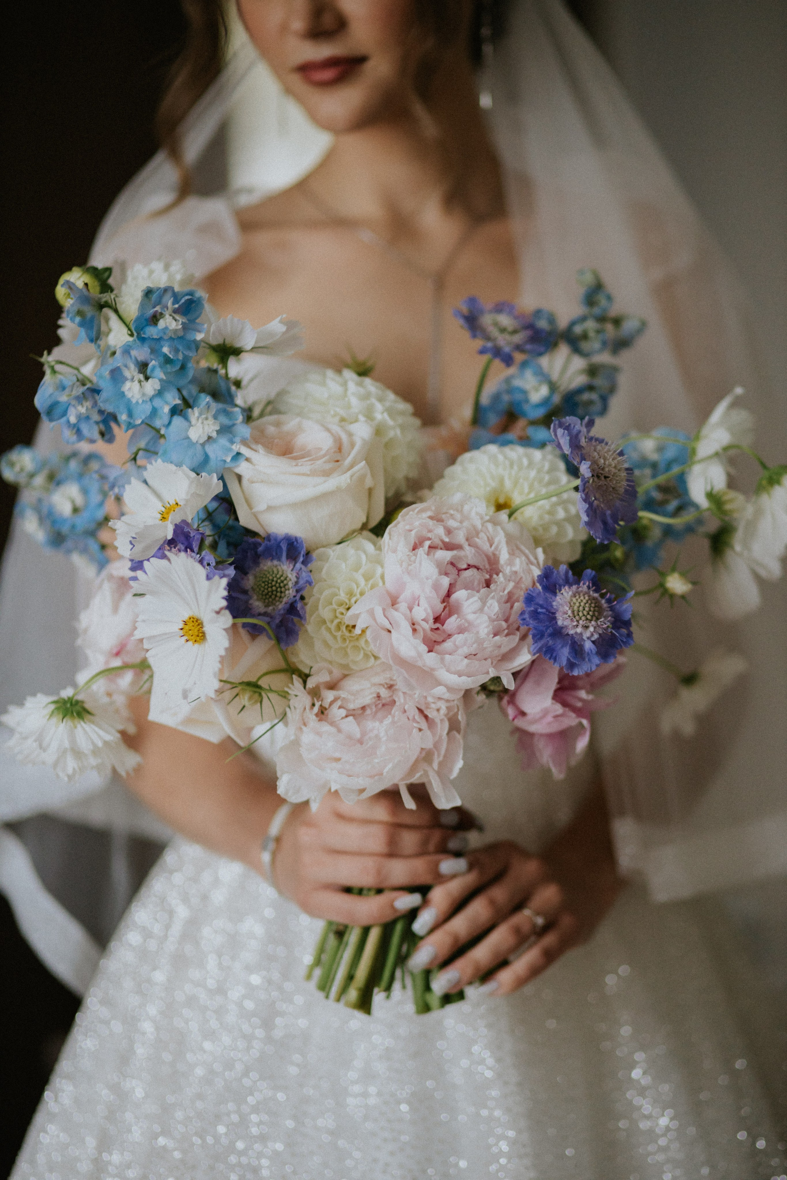 "Bridal bouquet with soft pastel flowers"