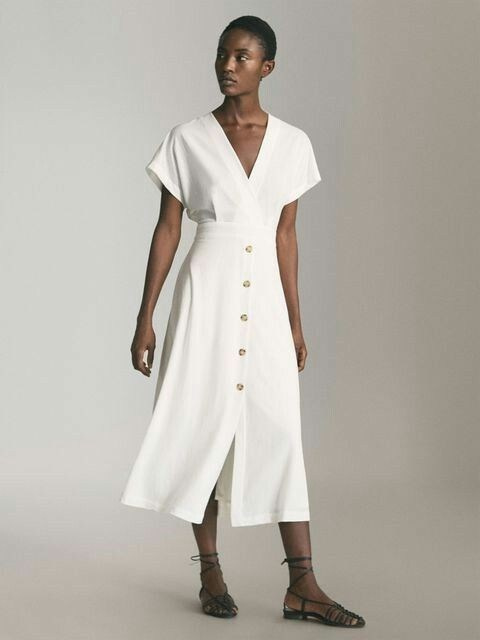 Produção de moda para ensaio de família, com roupas leves e caimento natural