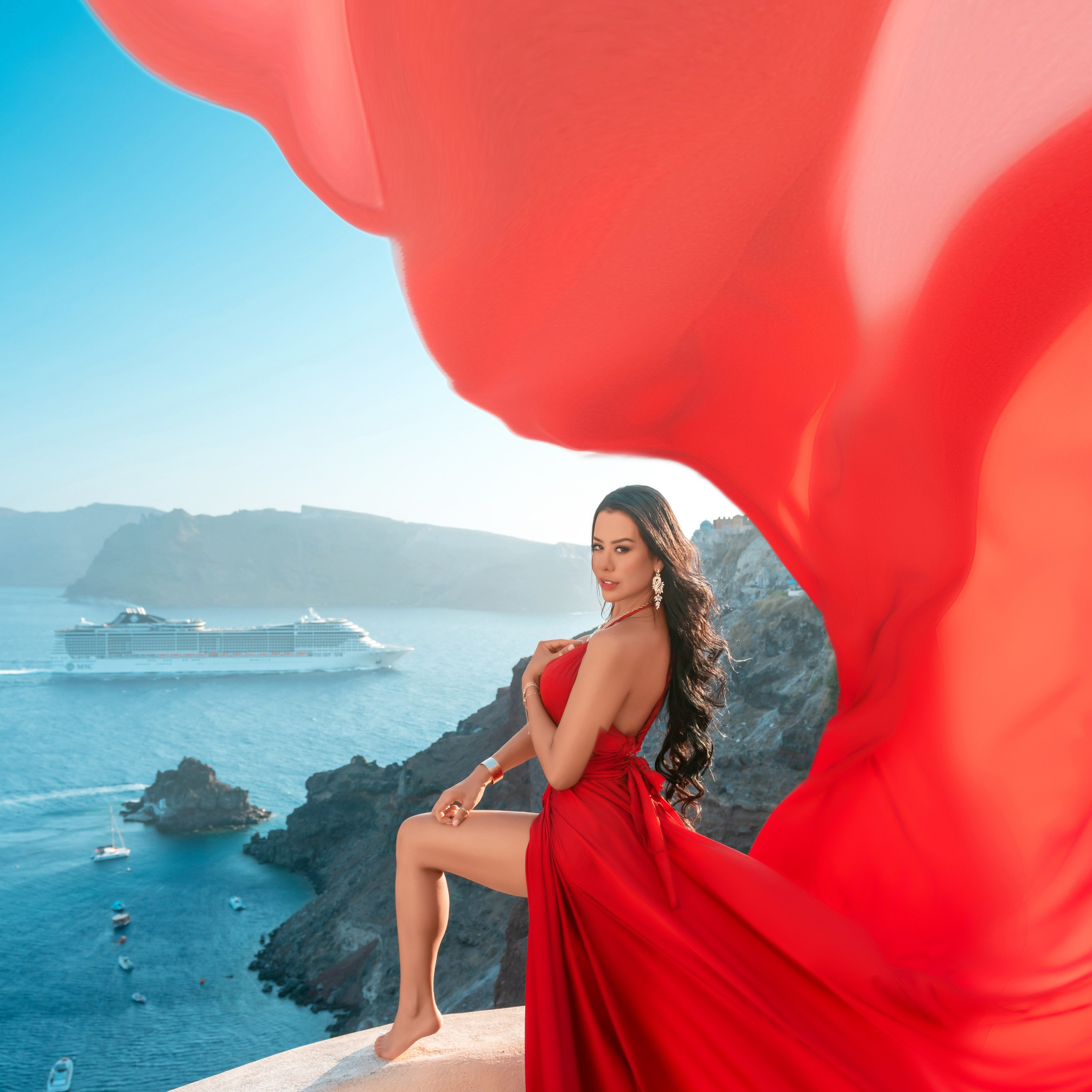 Nathalie Sossa in a flying dress Santorini