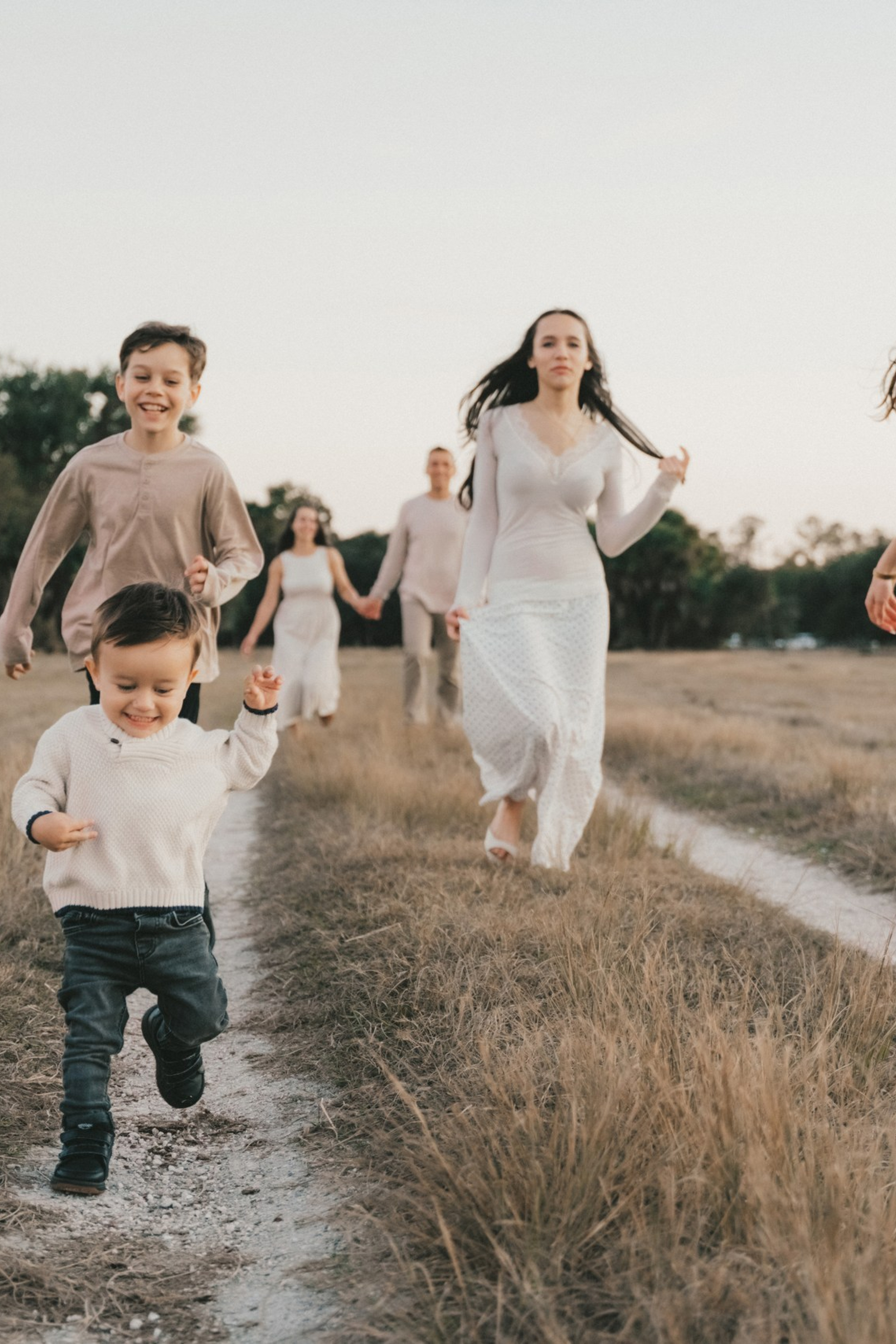 Love in Motion: A Family Sunset at Siesta Key. Your Florida Photographer | North Port | Port Charlotte | Venice | Sarasota | Maria Leonova Photography