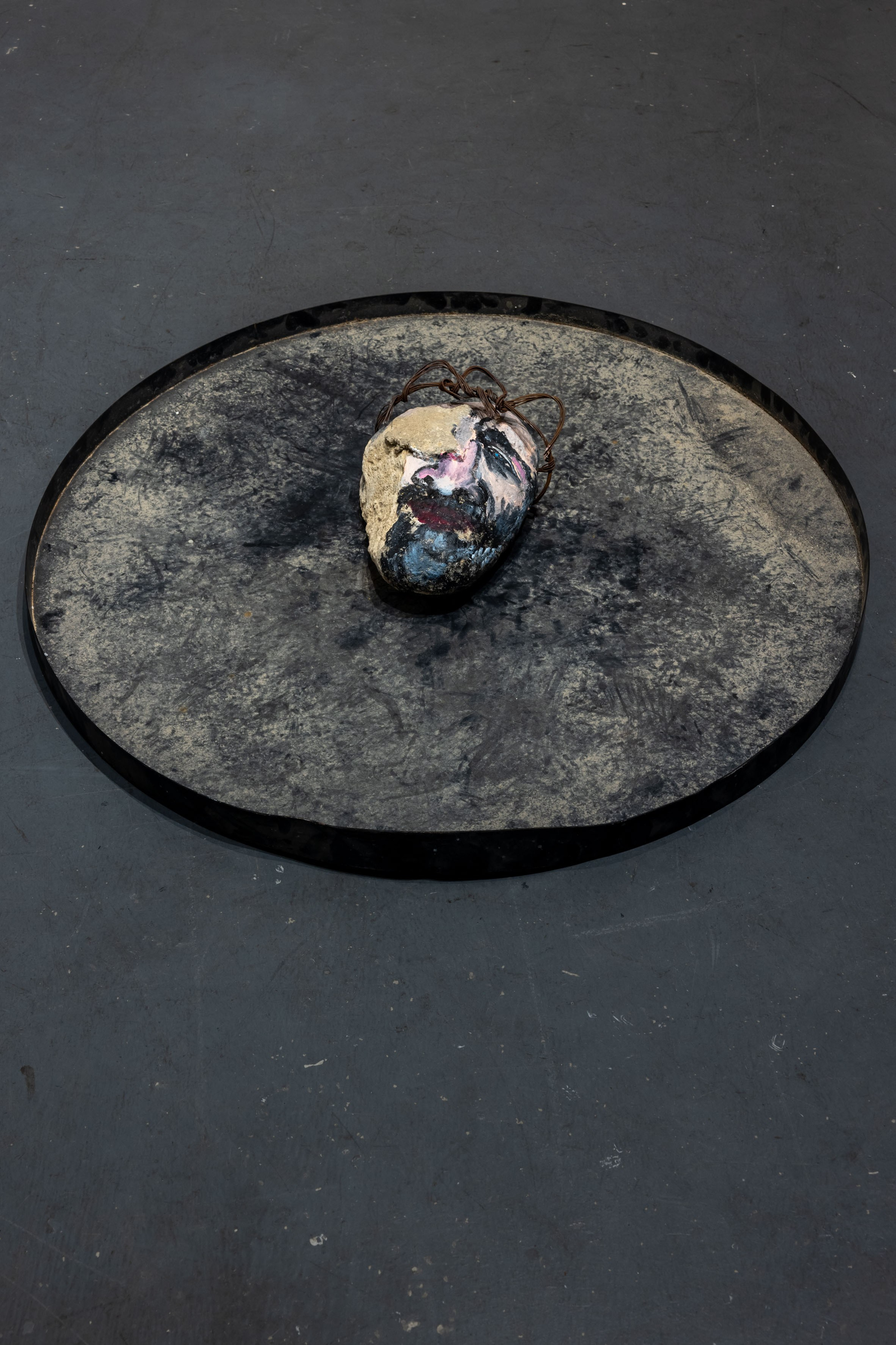 King’s stone head on a plate, 2024