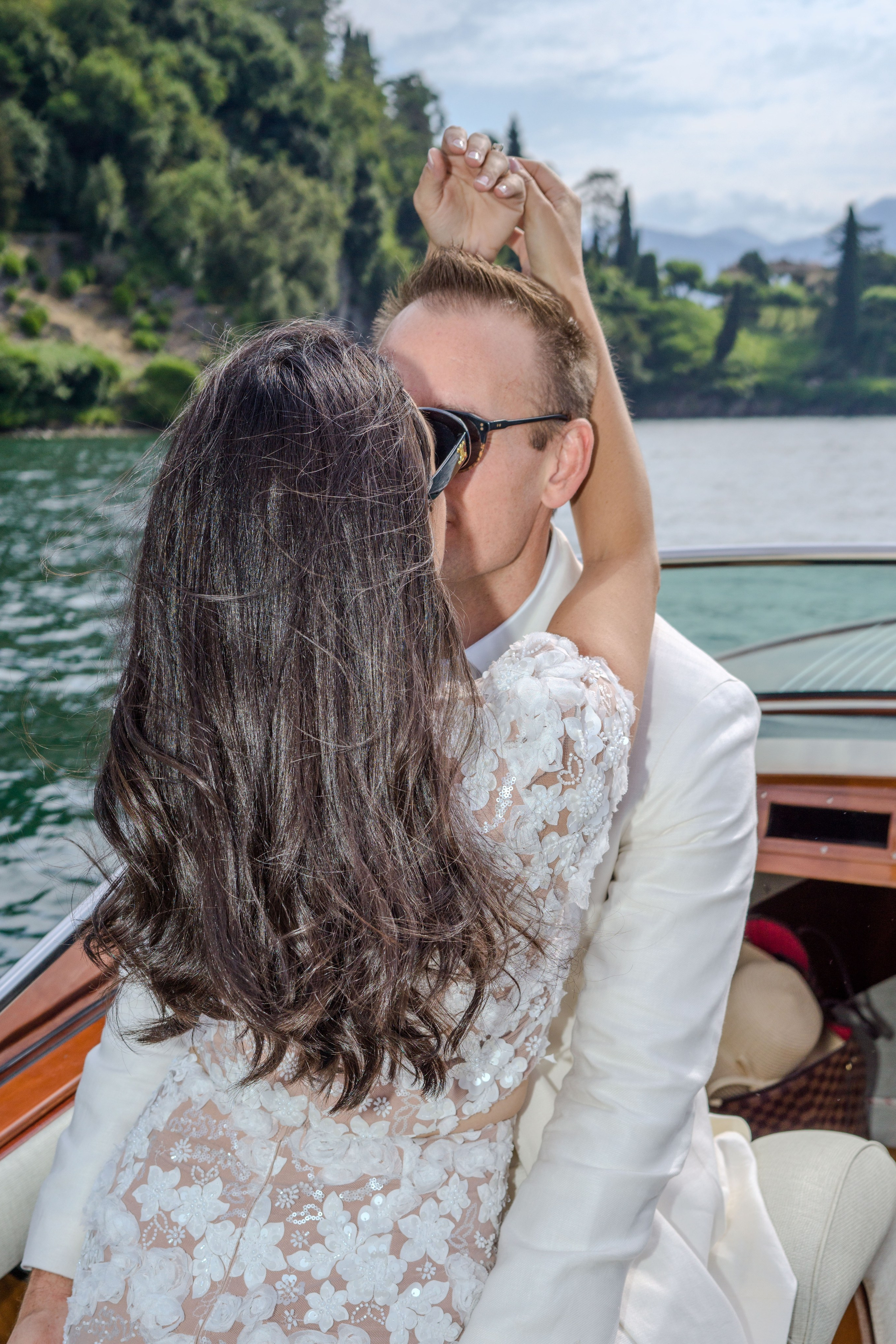 Andrea’s fiancé proposing in the gardens of Villa del Balbianello.