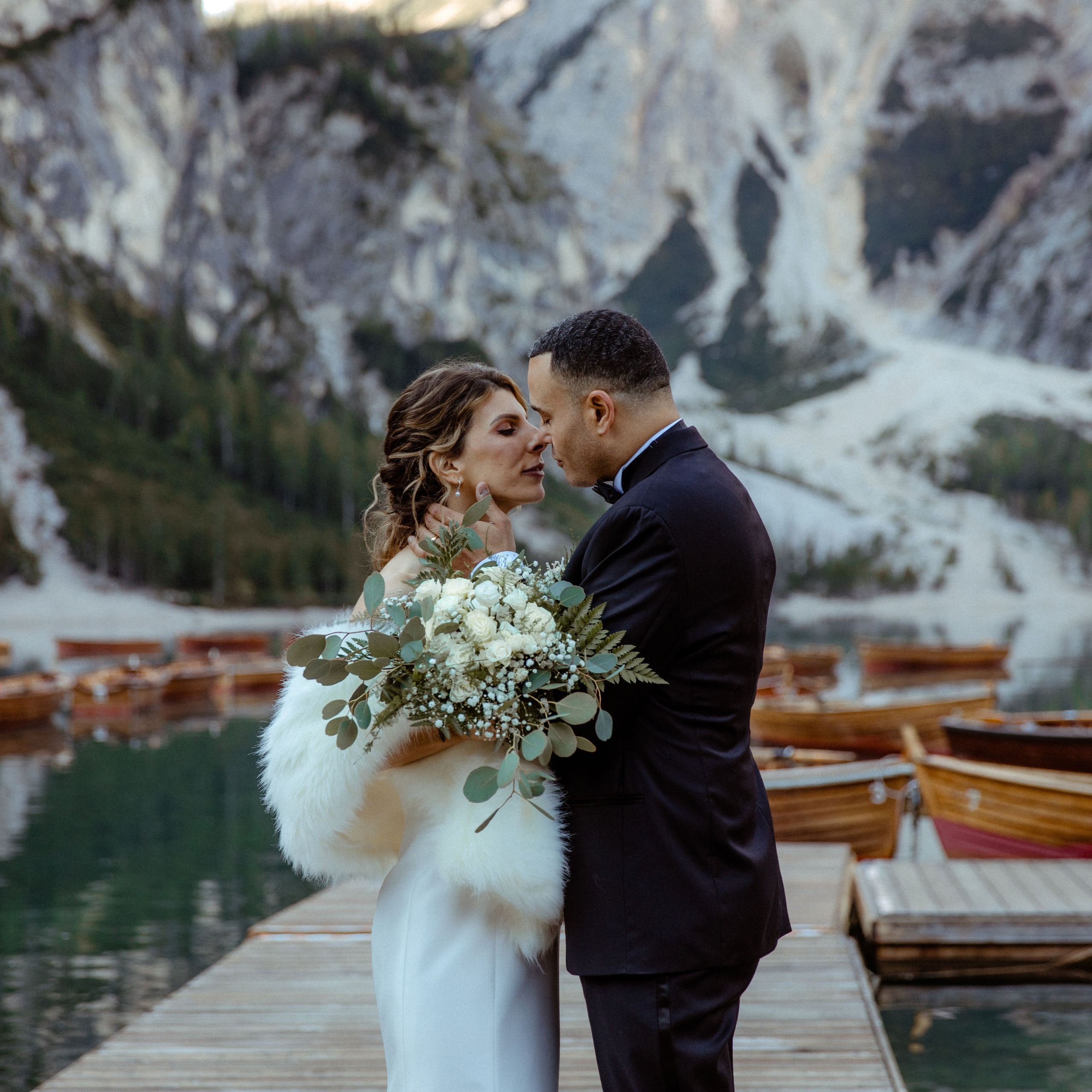 A couple staying in front of Lago do Braies