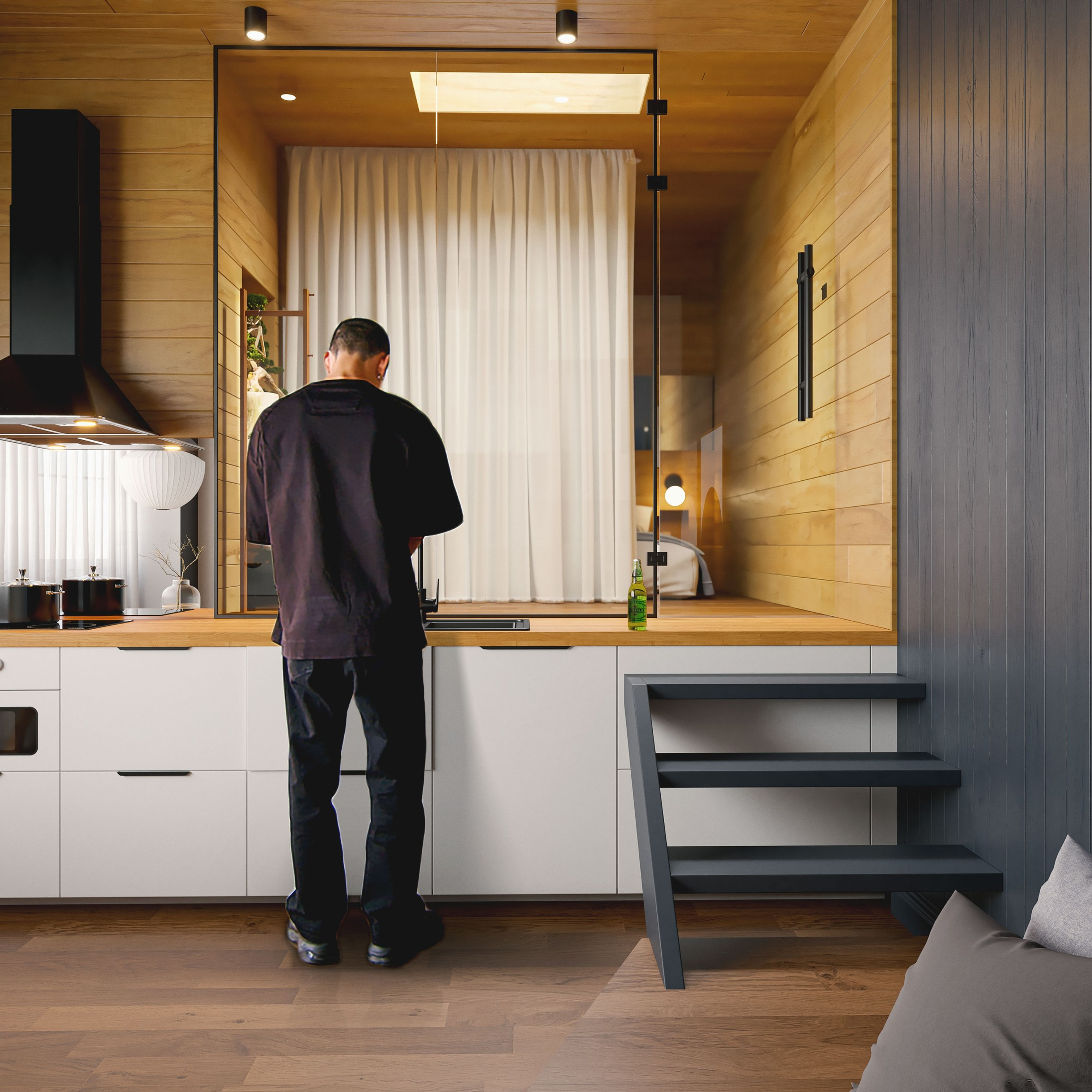 A man standing in front of the Kitchen counter in the Ryokan manly house