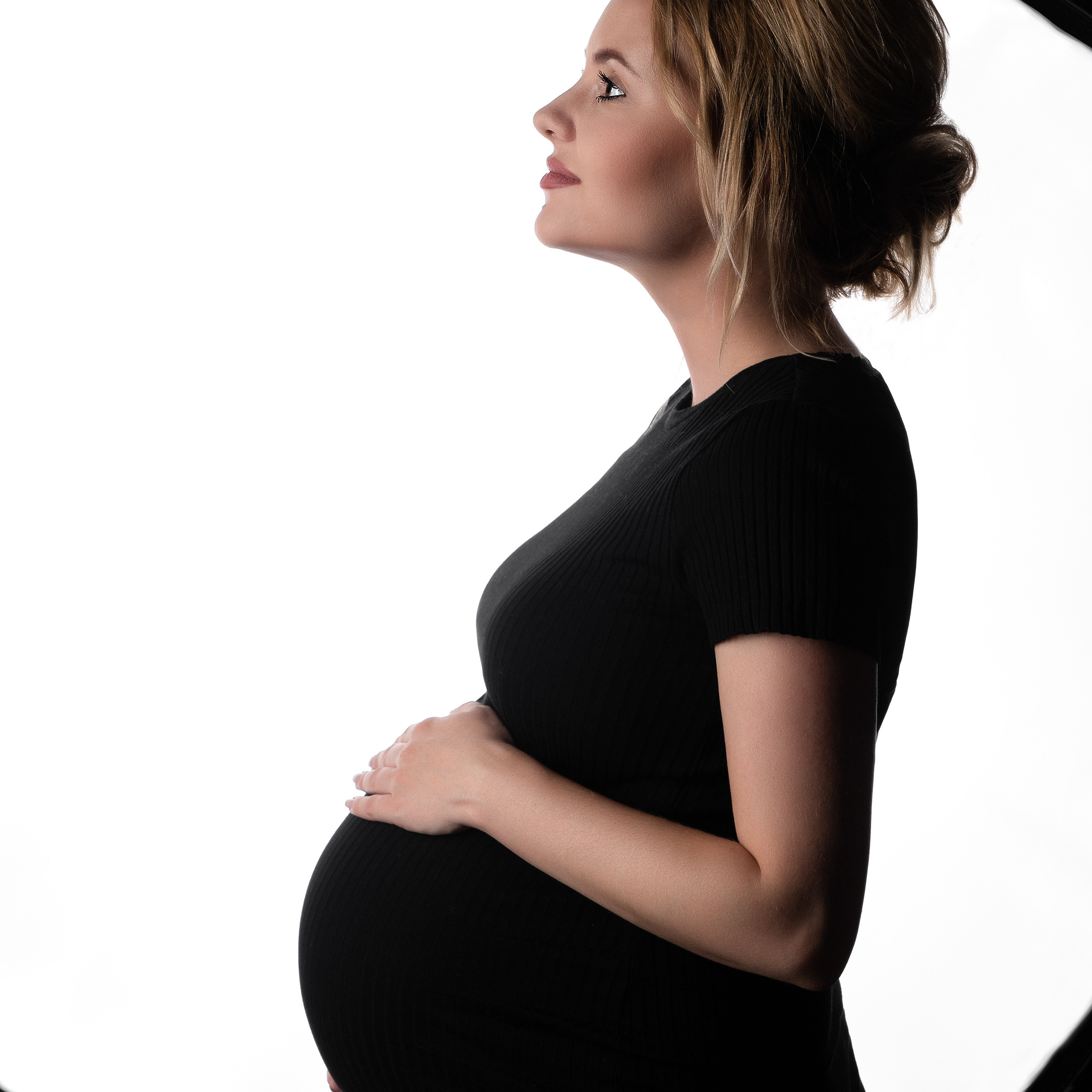 Photography of pregnancy in a photo studio