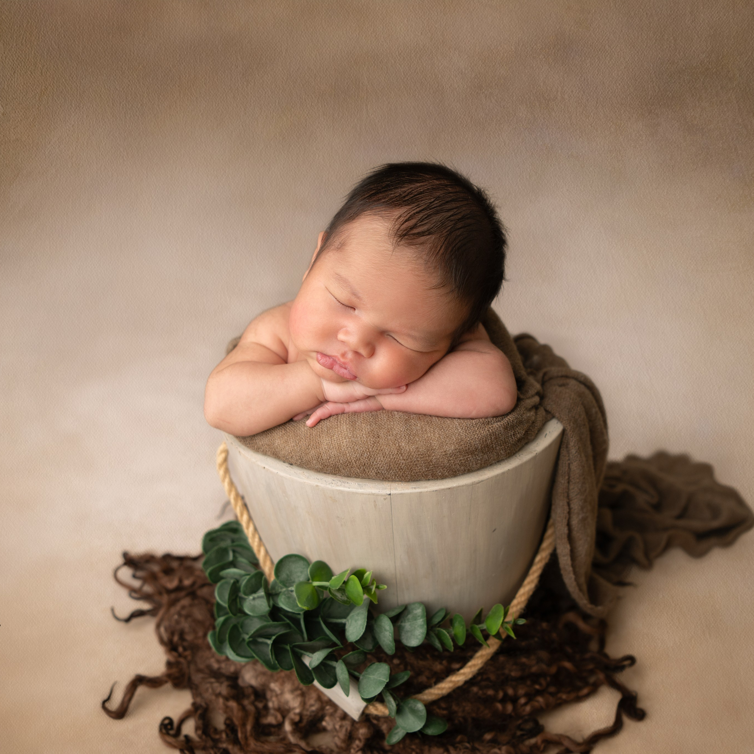 Newborn photo session in Doha Qatar, baby, sitter, cake smash, pre-birthday, maternity, family photographer in Doha, Qatar