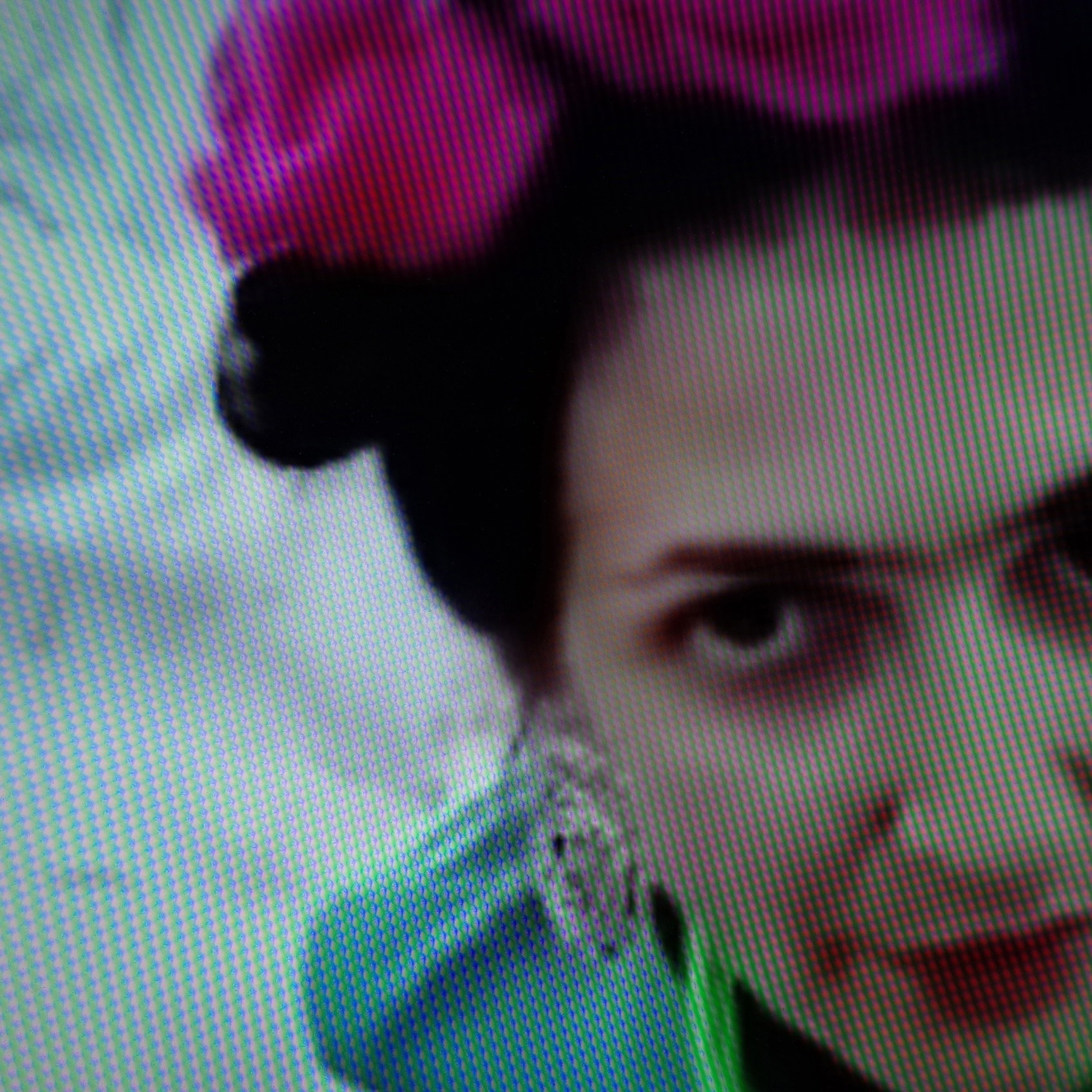 A digital performance merging photography and IT simulation. The artist, based in Israel, conducts a remote photoshoot with models in Turkey via a glitch-prone video call. The final images are intentionally pixelated, captured by photographing a computer screen—highlighting digital fragility and failed communication. A commentary on distance, technology, and the imperfections of virtual connection.