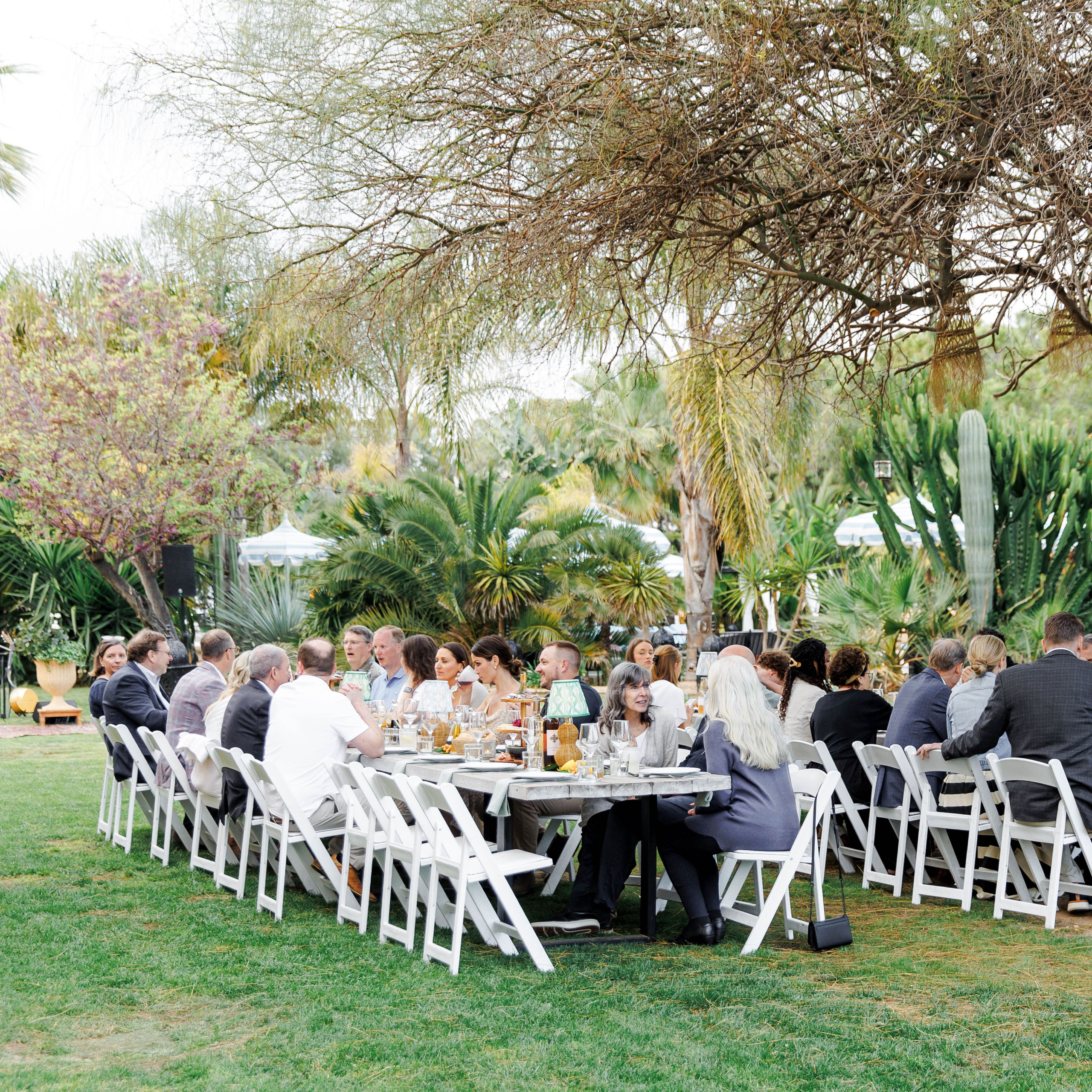 Guests enjoy outdoor rehearsal dinner at Gran Villa Rosa, Sitges