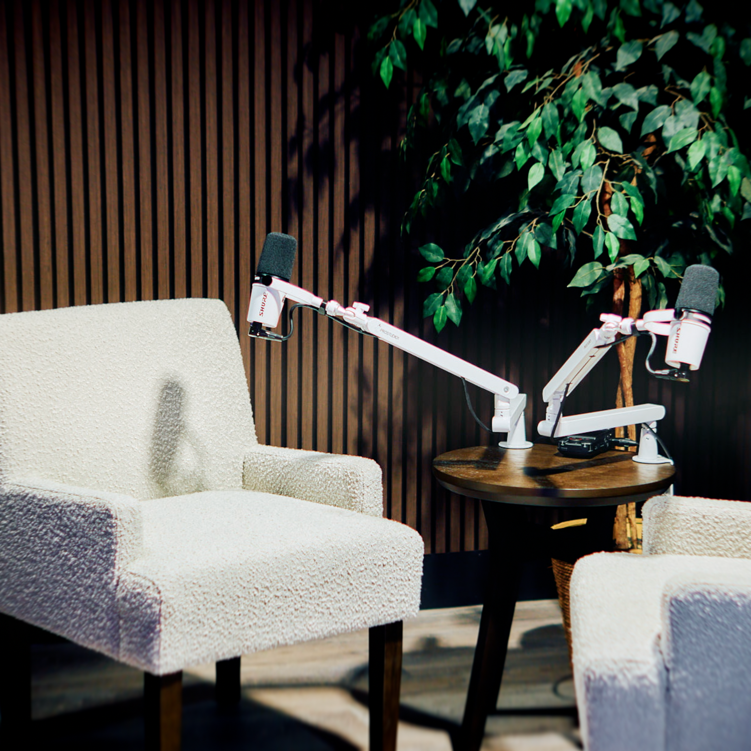 Zone 2 lounge-style interview set at ProStudio1 near Miami — a cozy, cinematic space in Hollywood, FL for podcasts and on-camera conversations.