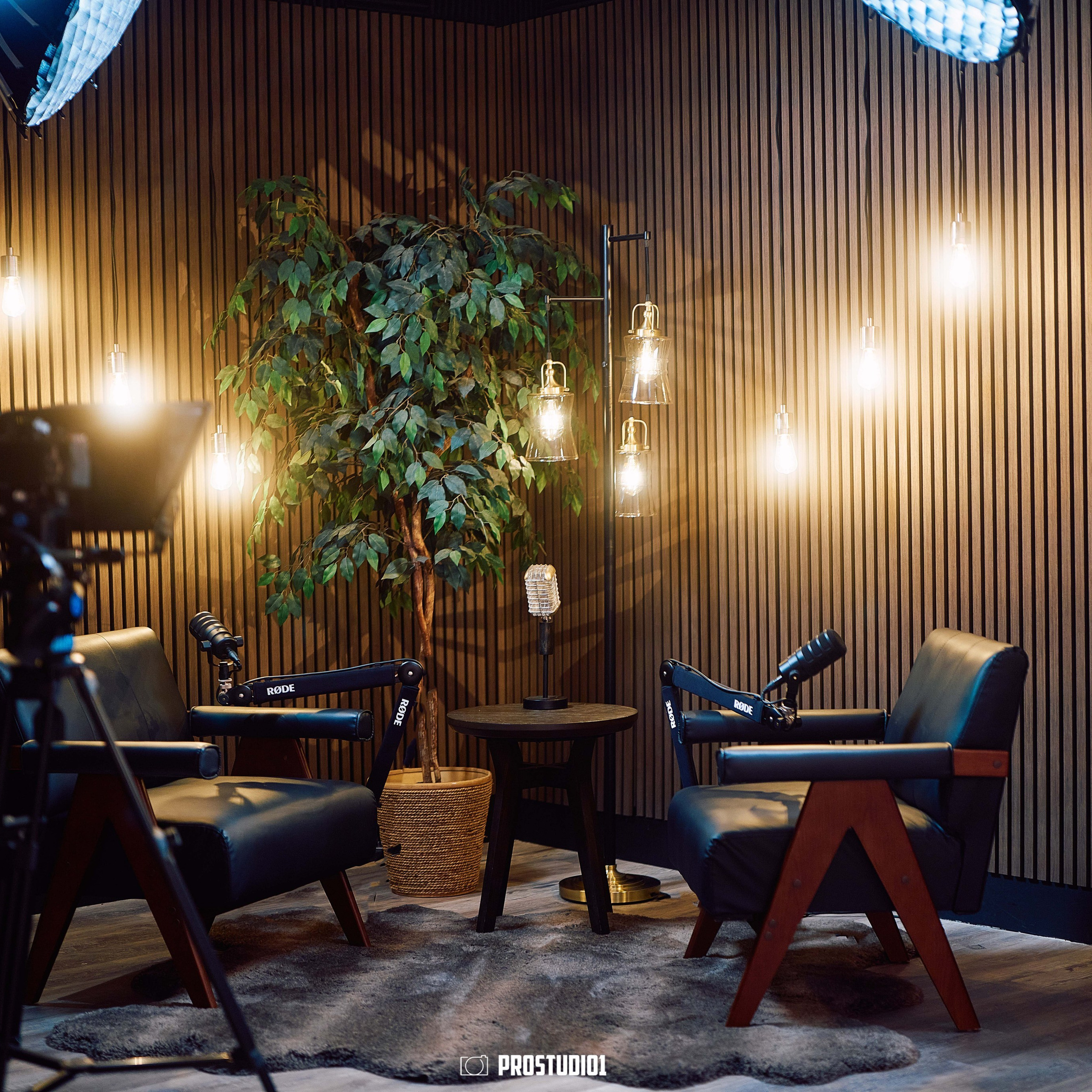 Wide view of Zone 2 Cinematic Lounge at ProStudio1 in Hollywood, FL (near Miami) for interviews, podcasts, and cinematic brand storytelling.