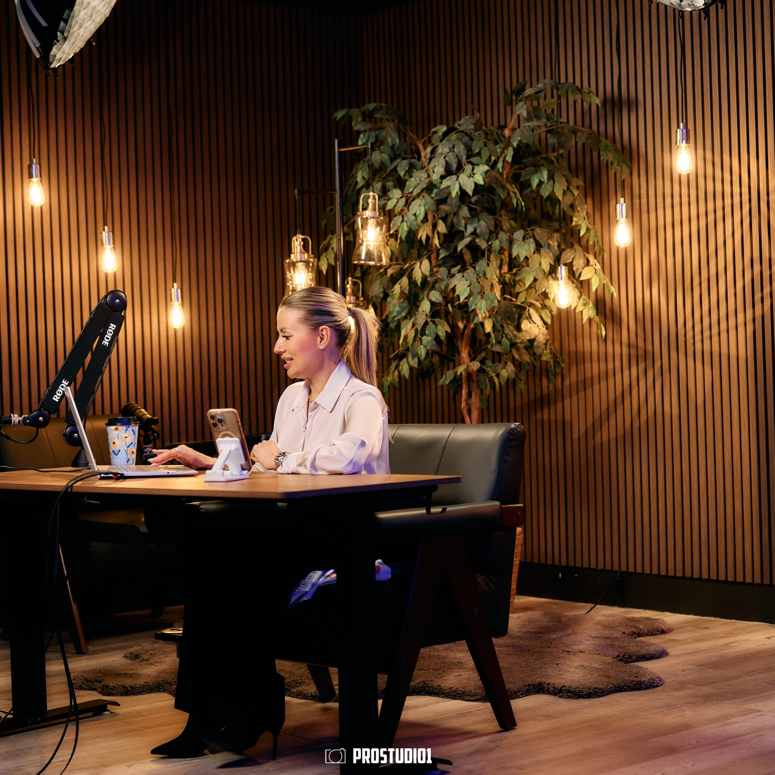 Studio discussion filmed at a table in Zone 2 at ProStudio1 Hollywood, FL — perfect for podcast conversations, business interviews, and social media clips.