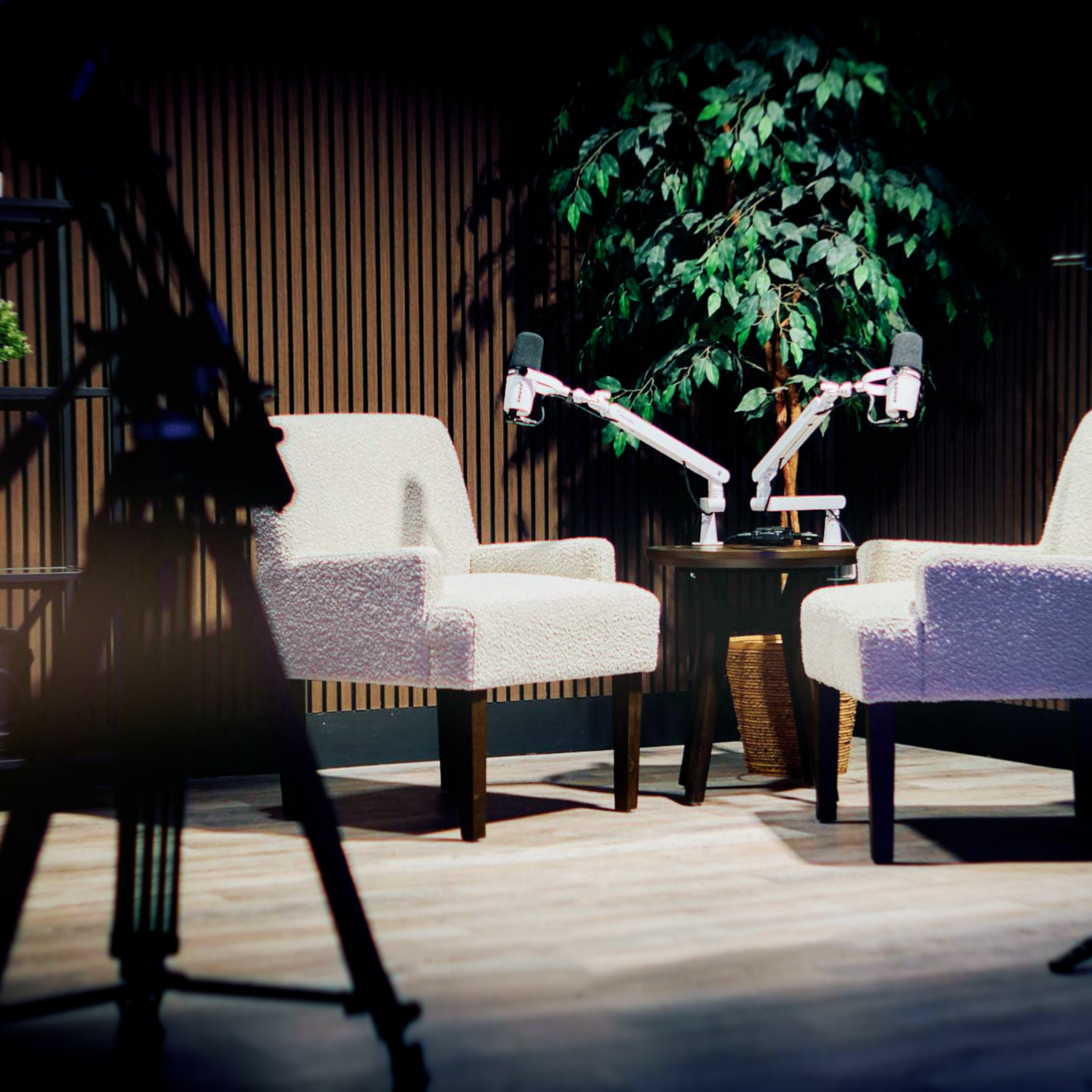 Behind-the-scenes filming in Zone 2 at ProStudio1 in Hollywood, Florida — recording interviews and brand videos in a cinematic lounge set near Miami.