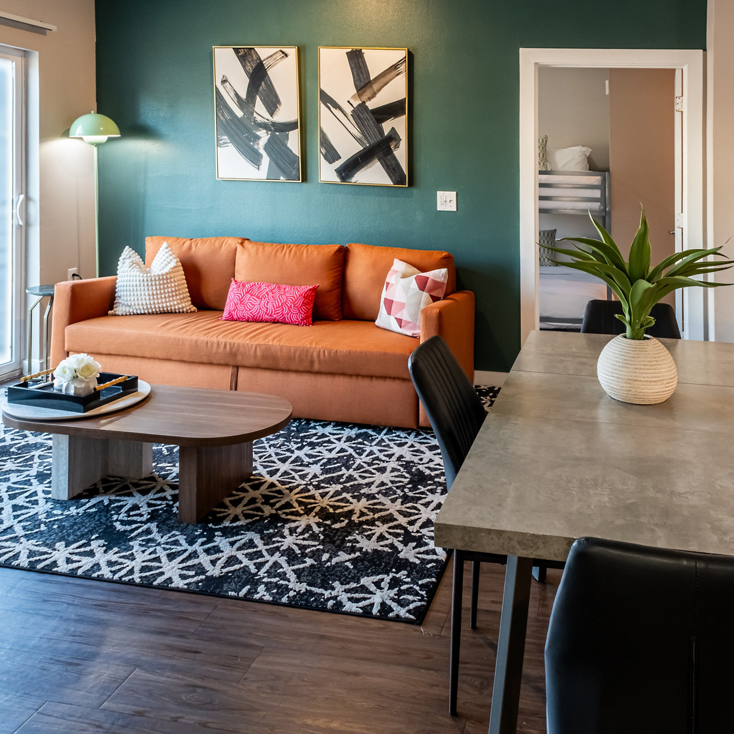 Bright modern living room with dinning table with natural light photographed in Austin TX