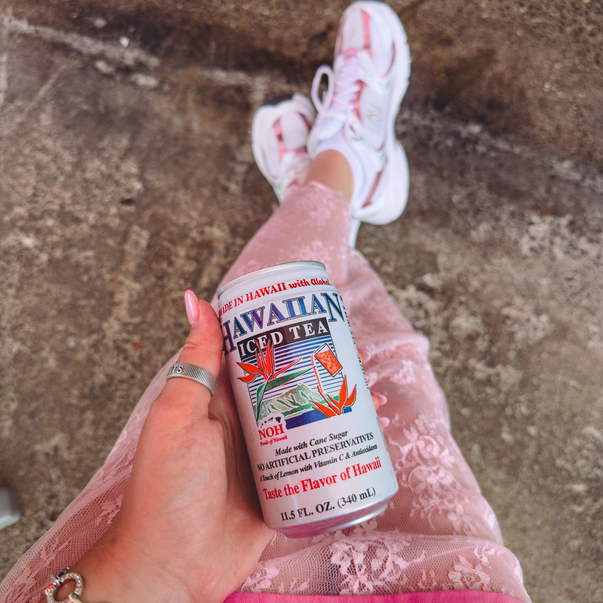 Hawaiian Iced Tea can with pink lace and white sneakers