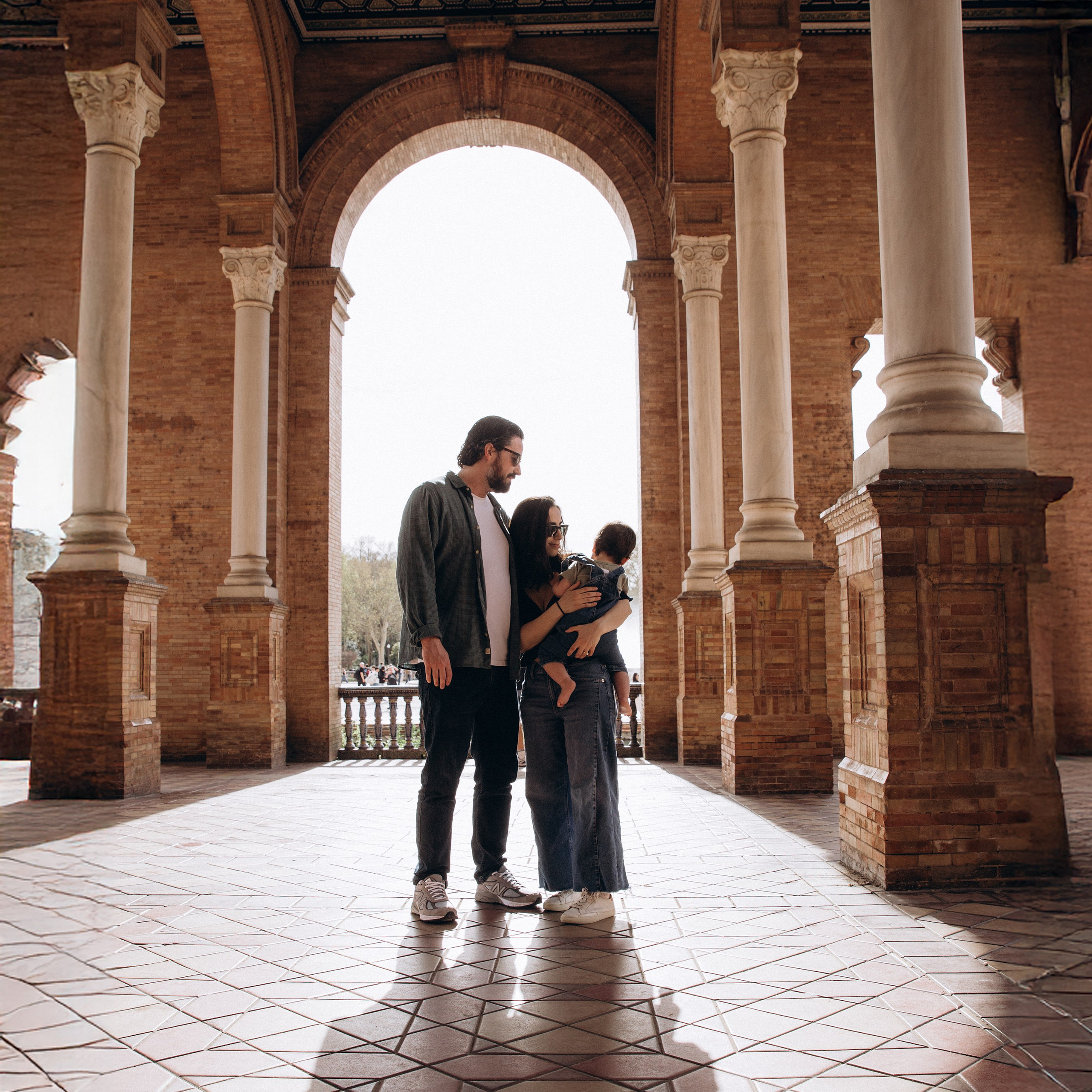 Family photoshoot at Plaza de España in Seville, Spain