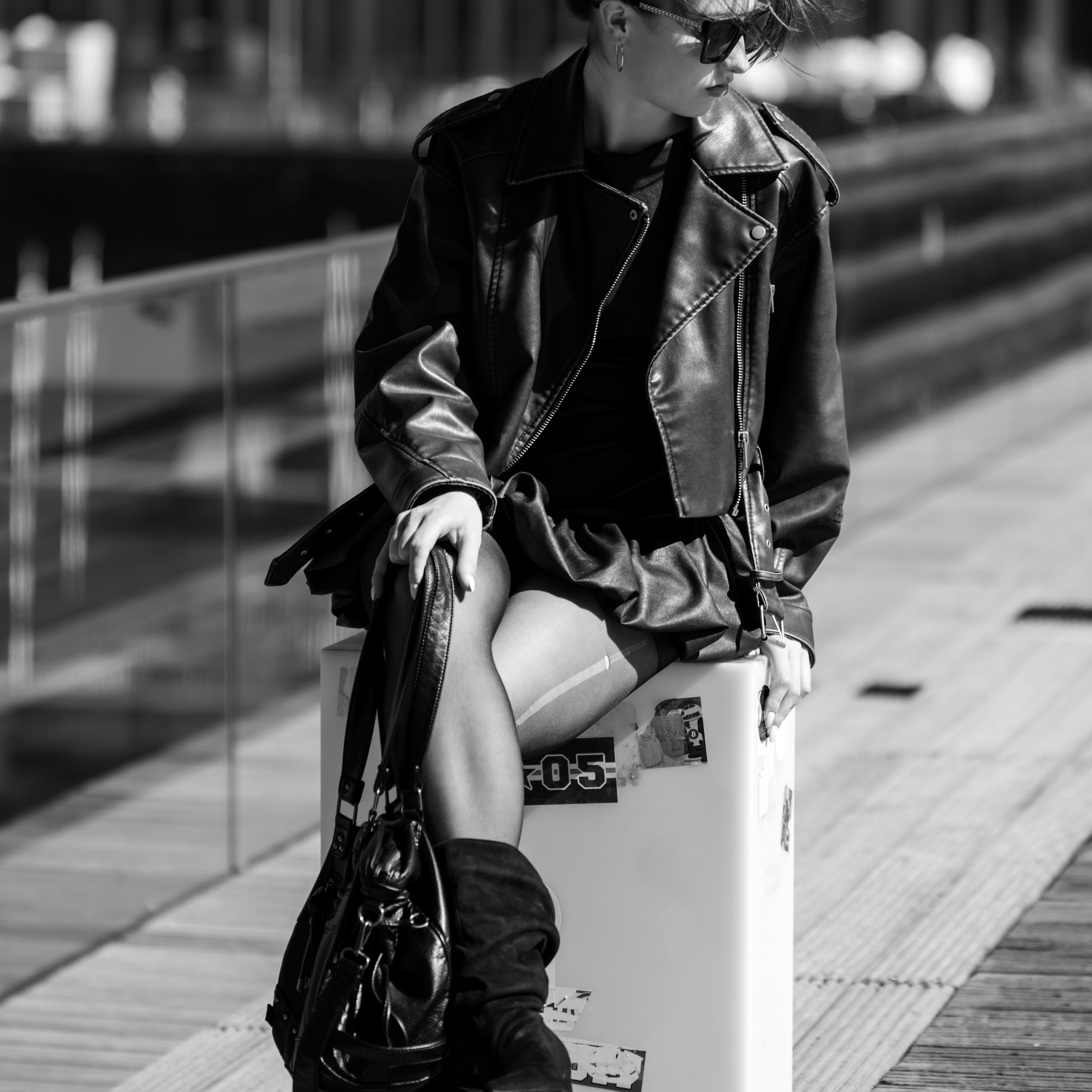 Photoshoot in DusseldorfStreet fashion photographyMedienHafenBlack and white photographyStreet style aestheticGirl in a leather jacketUrban fashion shootDusseldorf lifestyle photography