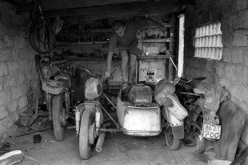 In the garage for motorcycles, Senshin khutor, Oblivsky district, Rostov-on-Don region, Russia. July 2010