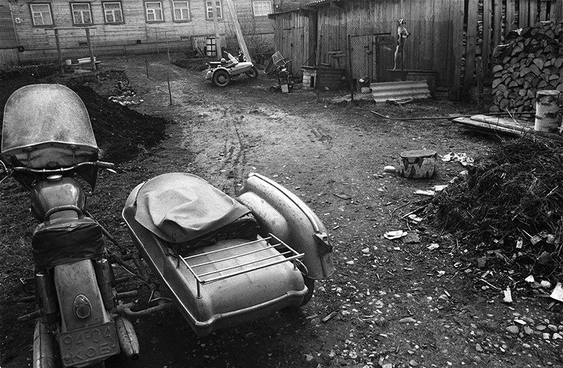 Two motorbikes with a sidecar and a dog, Chukhloma, Kostroma region, Russian SFSR. May 1989