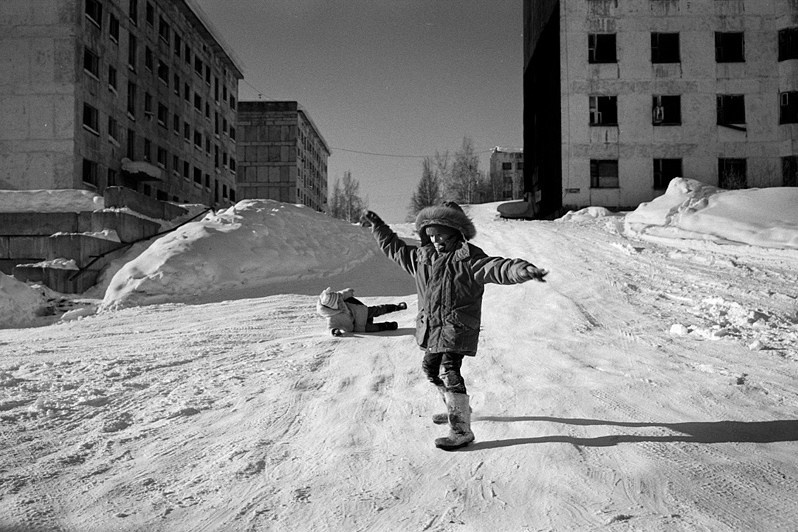Playing children, Sinegorye settlement, Yagodinsky district, Magadan region, Russia. March 2015