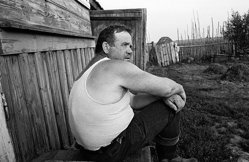 Man on the front porch, Yaroslavl region, Russian SFSR. July 1983