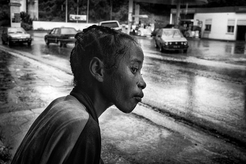 Look left and right before crossing the street in the rain, Fianarantsoa, Republic of Madagascar. 2014