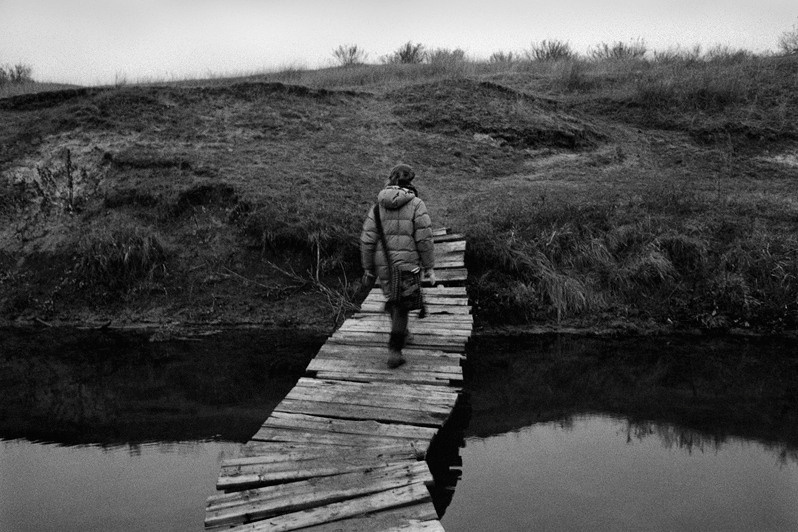 Over the bridges of the Berezova River, Senshin Farm, Oblivsky district, Rostov region, Russia. January 2011