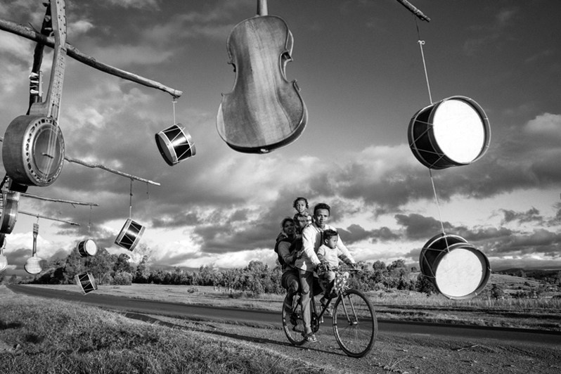 Handcrafted musical instruments and family bicycles on the Route Nationale 7, near Ambatolampy, Vakinankaratra region, Antananarivo province, Republic of Madagascar. 2022
