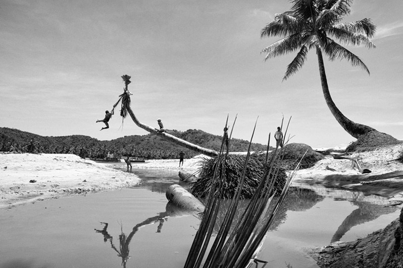 School recreation on the riverbank, near Serenambe, Mananara Avaratra district, Analanjirofo region, Toamasina province, Republic of Madagascar. 2014