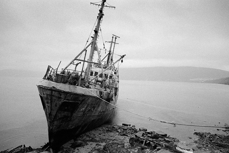 Cemetery of ships near the Fish Port, Magadan, Russia. August 2014