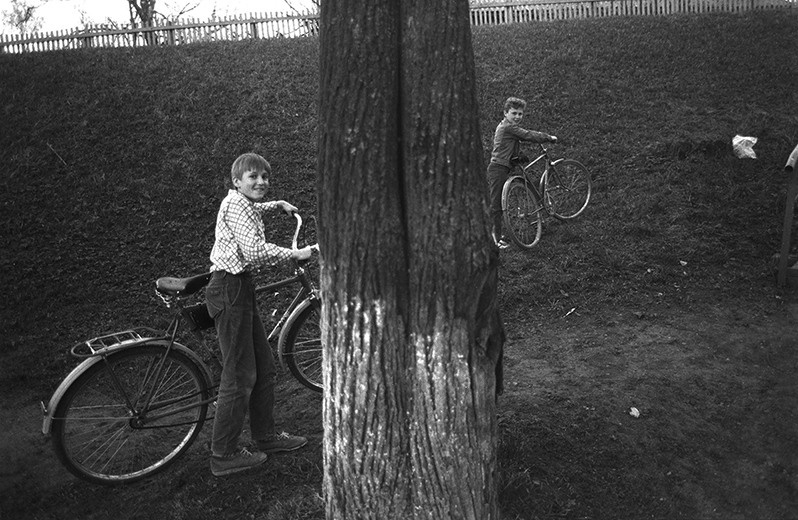 Two cyclists, Chukhloma, Kostroma region, Russian SFSR. May 1989