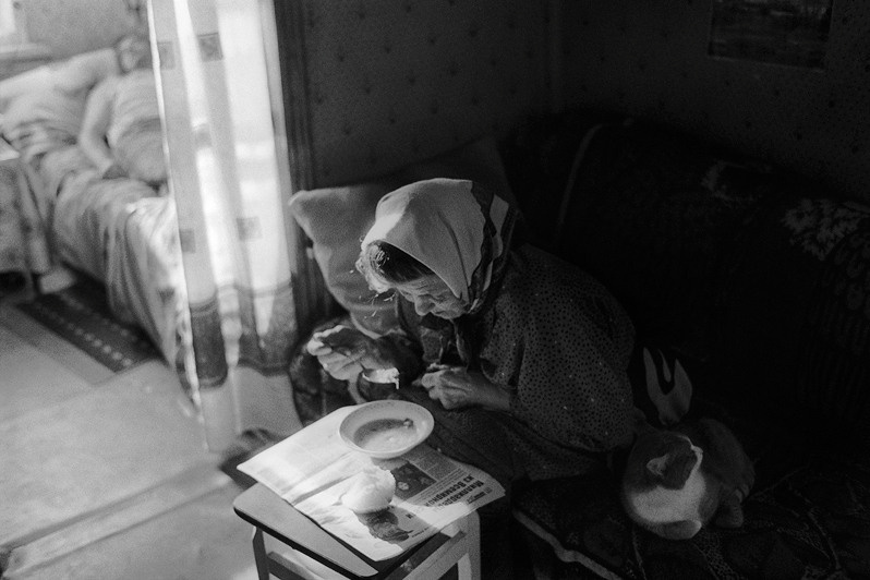 A bowl of soup on a newspaper, Senshin khutor, Oblivsky district, Rostov-on-Don region, Russia. January 2011