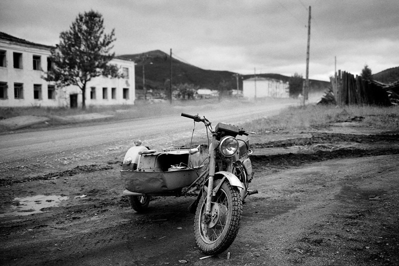 Motorbike with a pram, Atka urban-type settlement, Khasynsky district, Magadan region, Russia. August 2014