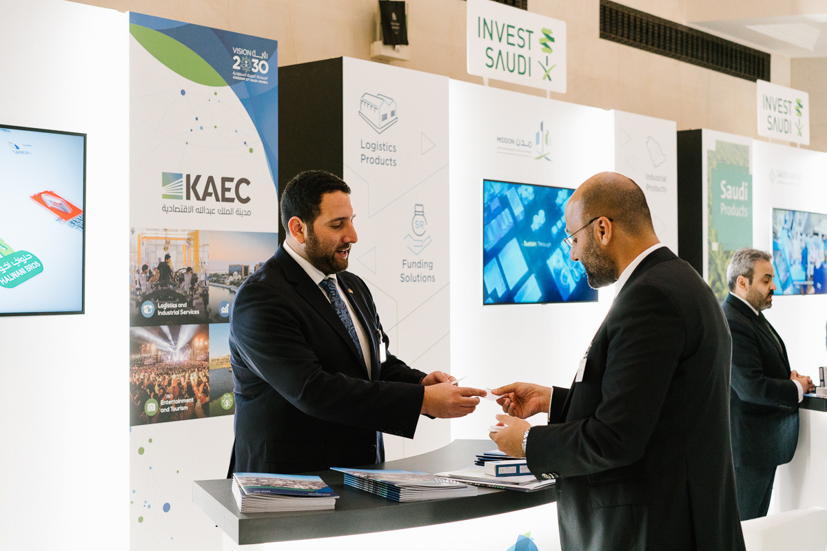 Networking at investment stand during the conference