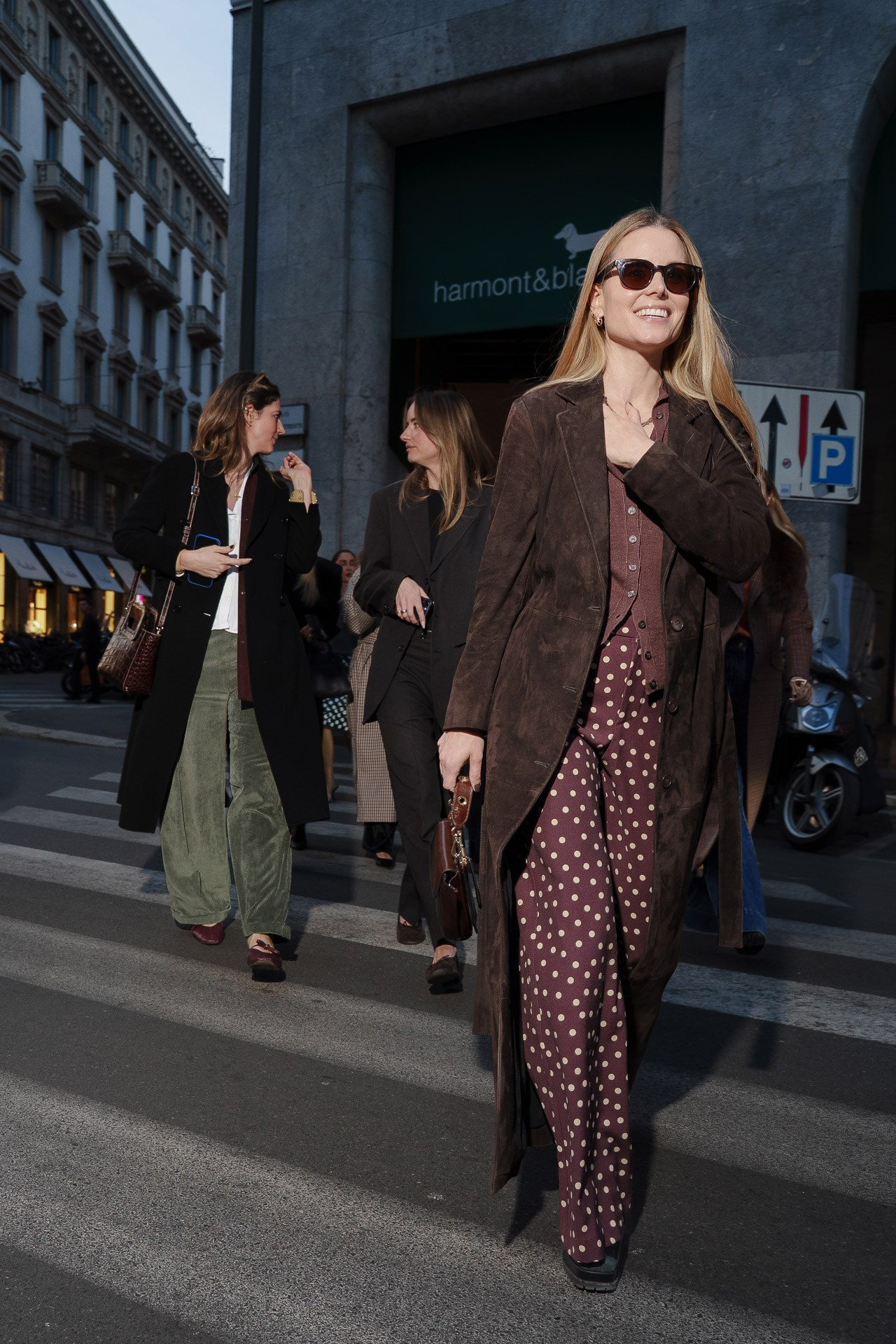Guests arriving for luxury skincare event in Milan city centre