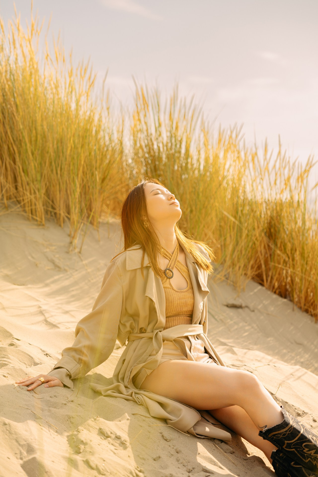 In the Dunes — Portrait Photoshoot on the Dutch Coast. Romantic & Soulful Photography by Natalia Olhova in Rotterdam