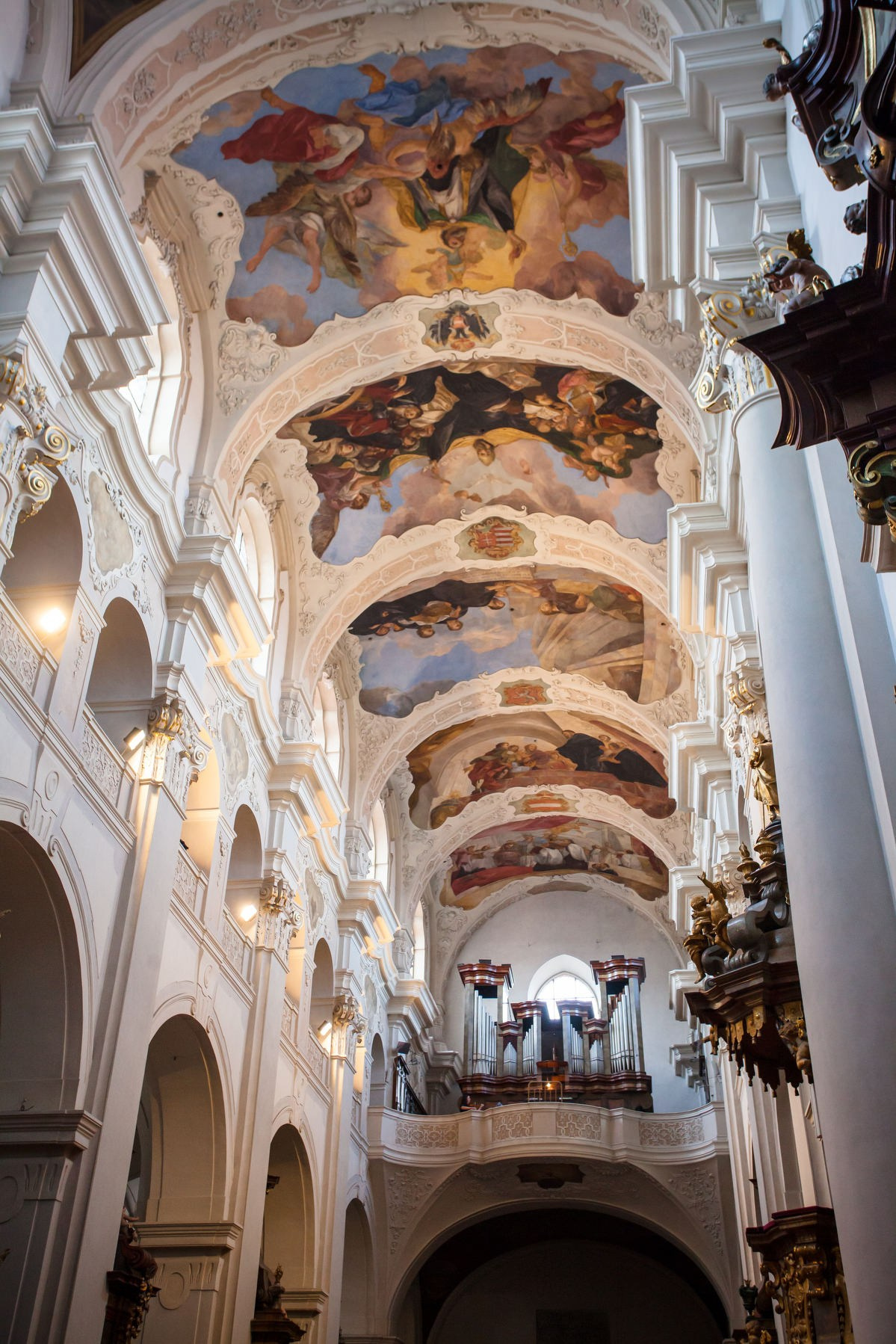 Wide view of painted ceiling frescoes at St. Thomas Church Prague wedding