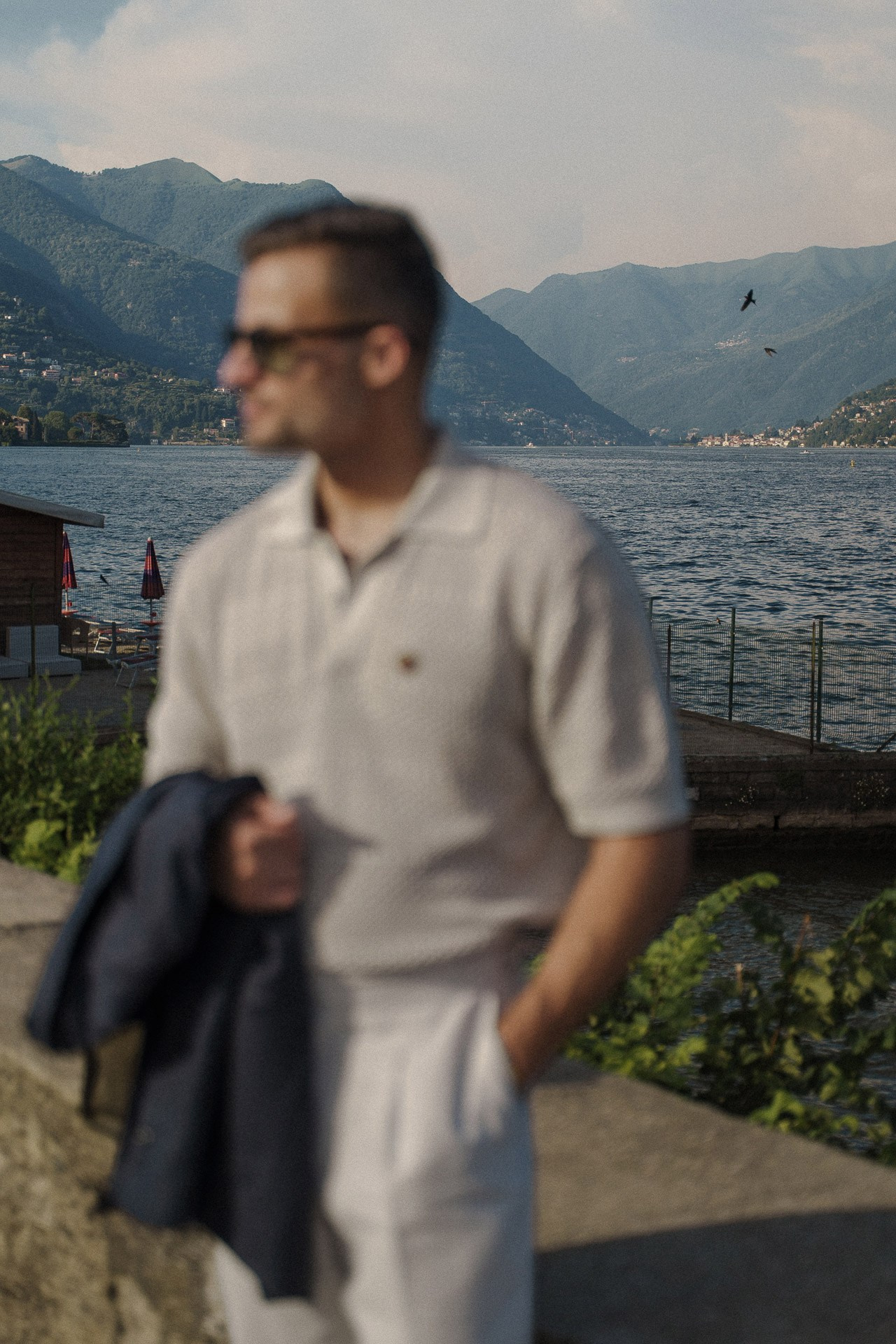Soft-focus travel portrait with Lake Como and mountain views