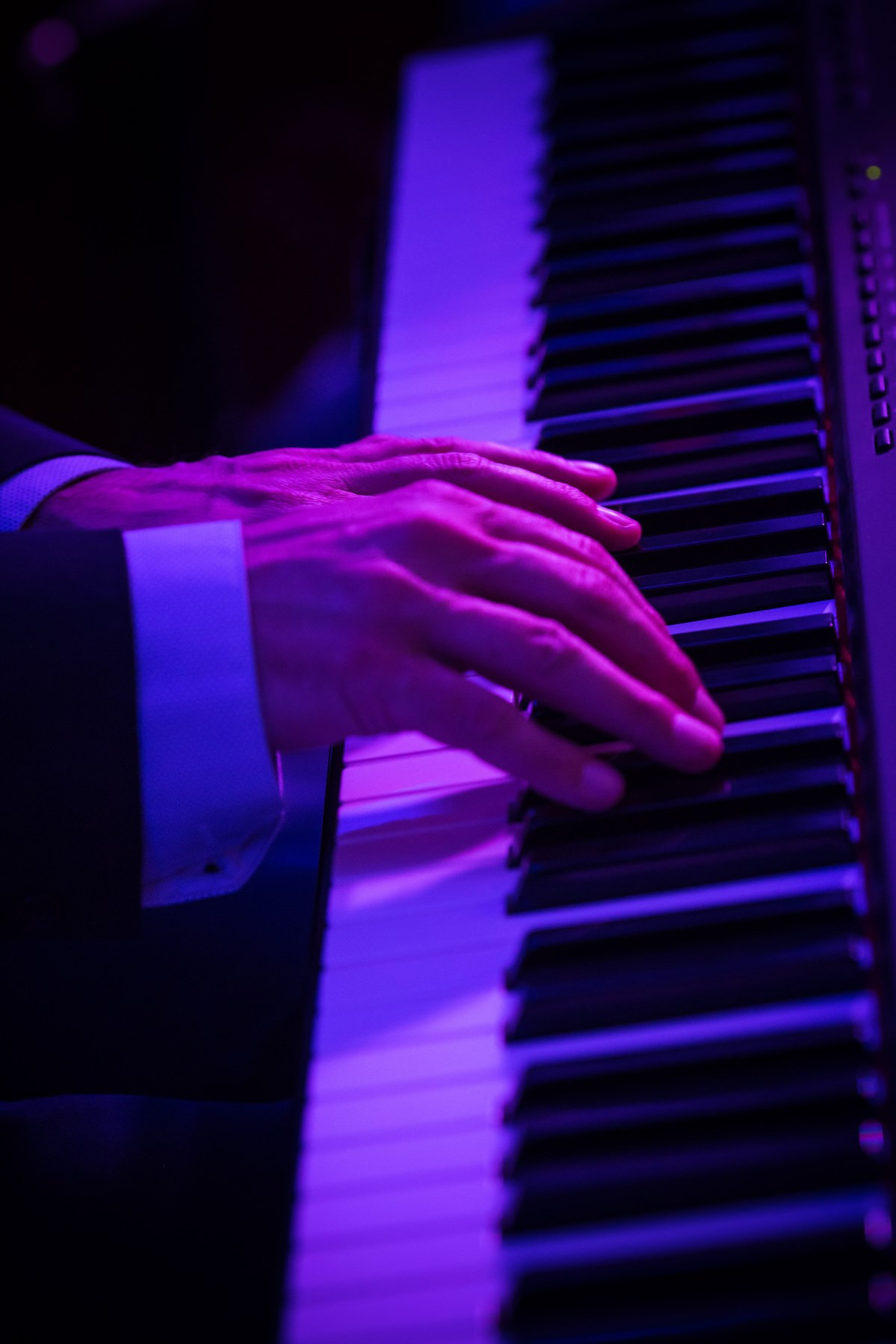 Pianist hands close-up live jazz wedding Four Seasons Prague