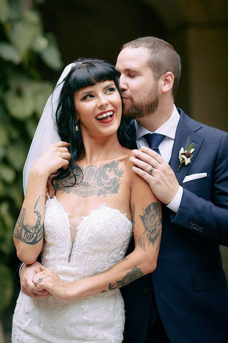 Courtney and Dean are embracing passionately in scenic Grebovka Park, Prague.