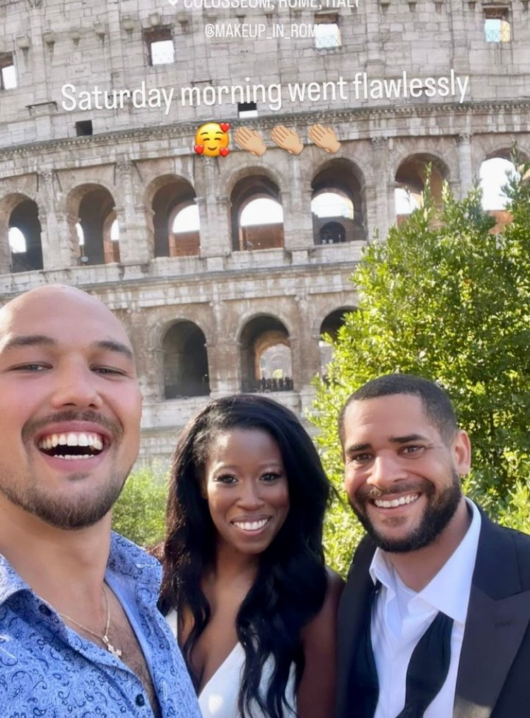 happy bride, groom and the photographer next to the colosseum right after the photoshoot in Rome