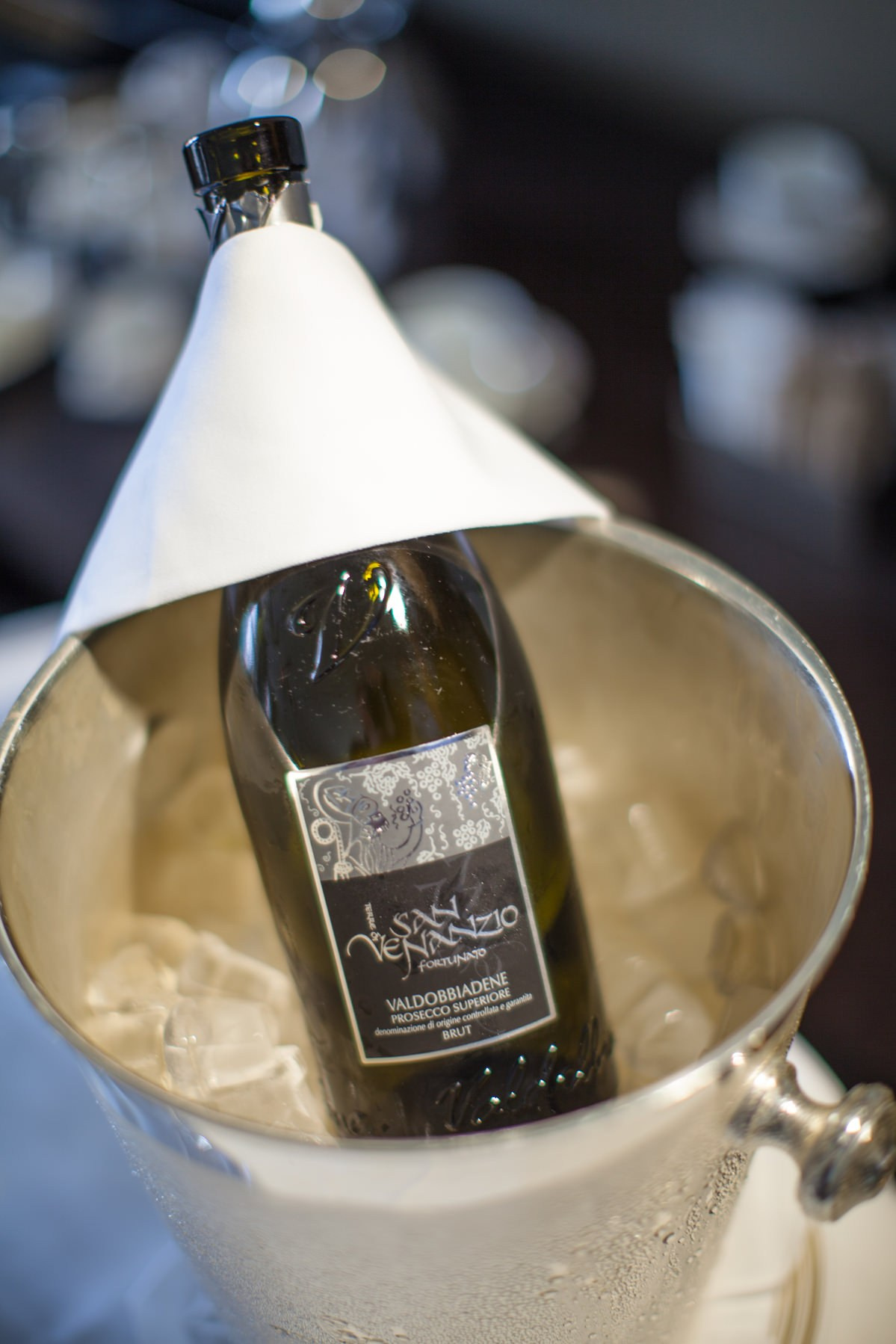 Chilled Prosecco bottle awaiting the bride during wedding preparations at Augustine Hotel in Prague
