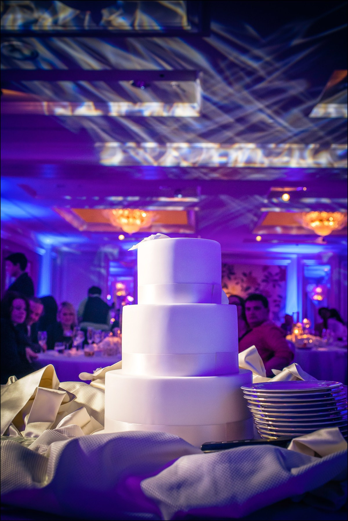 Elegant three-tier wedding cake Four Seasons Prague reception