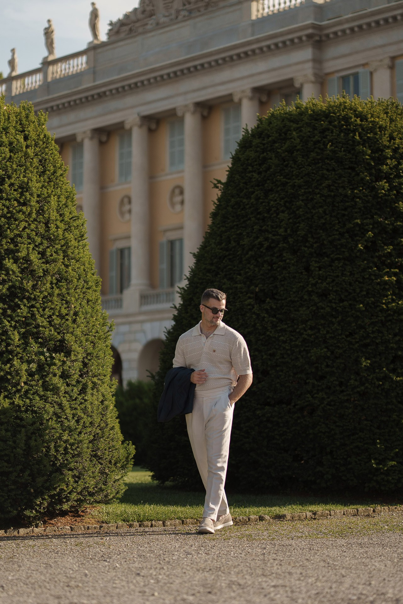 Male lifestyle portrait in the gardens of Villa Olmo on Lake Como