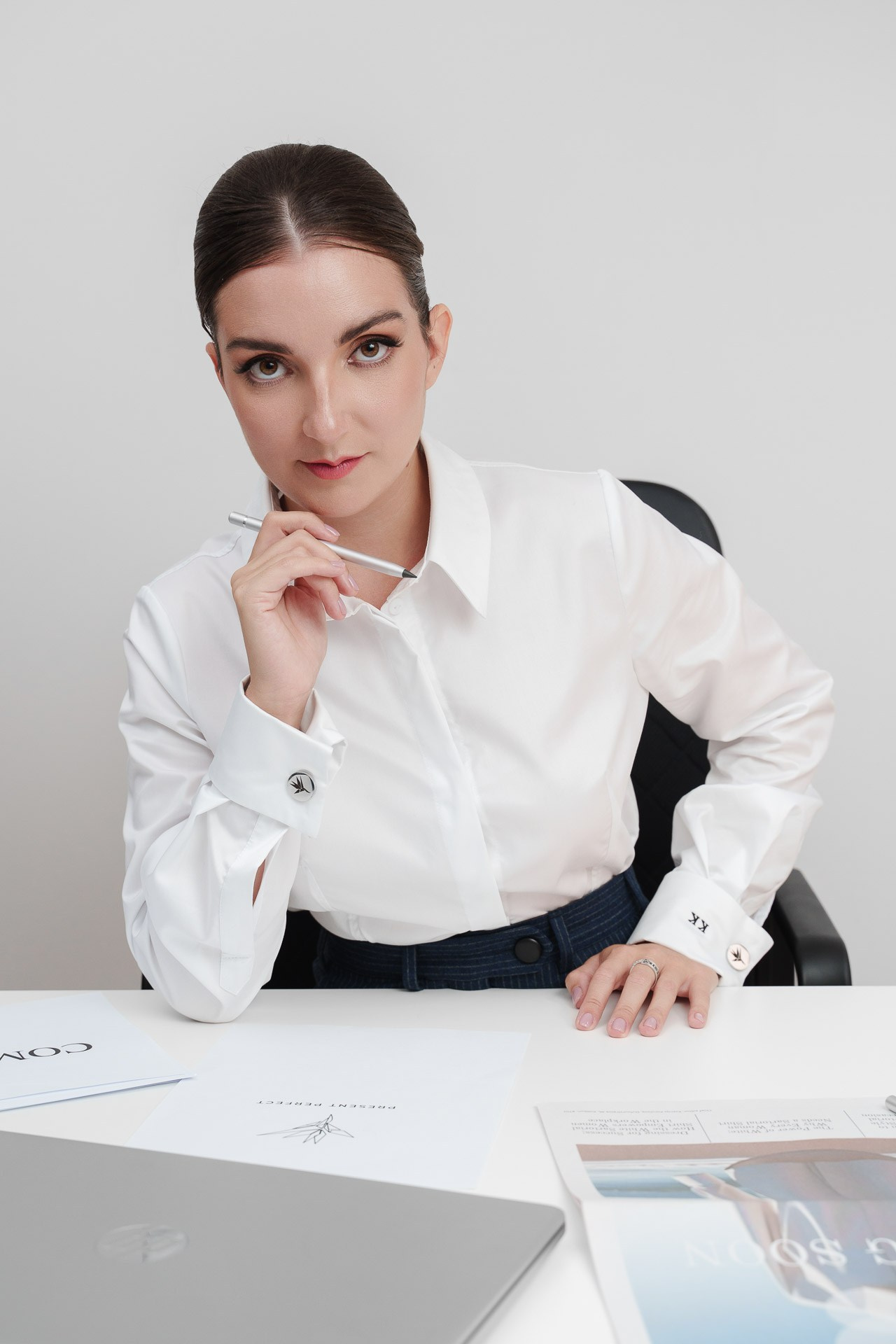 Corporate business portrait of a professional woman in an office setting in Milan