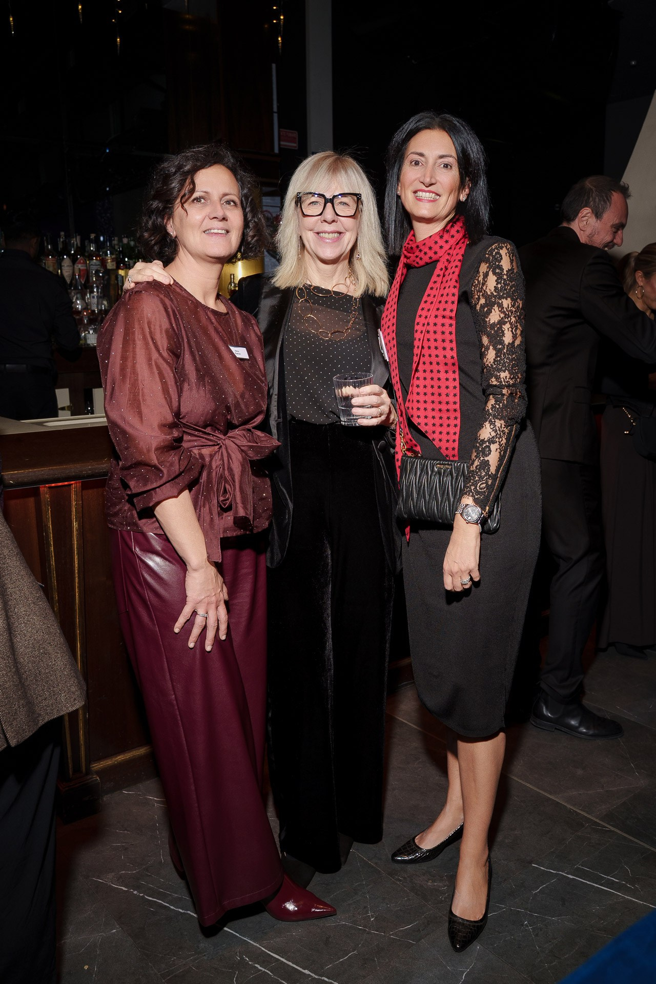 Team celebration and corporate party in Milan, capturing authentic moments and professional camaraderie