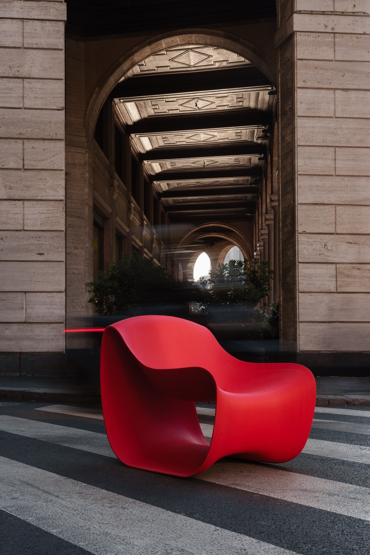Modern chair placed in architectural passage, design object photography